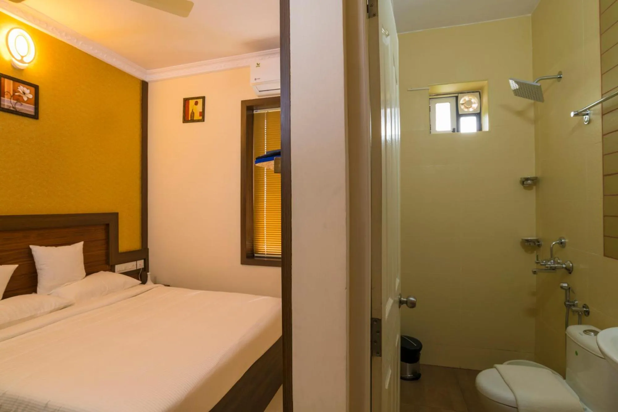 Shower, Bed in Blue Bell Cochin Airport Hotel