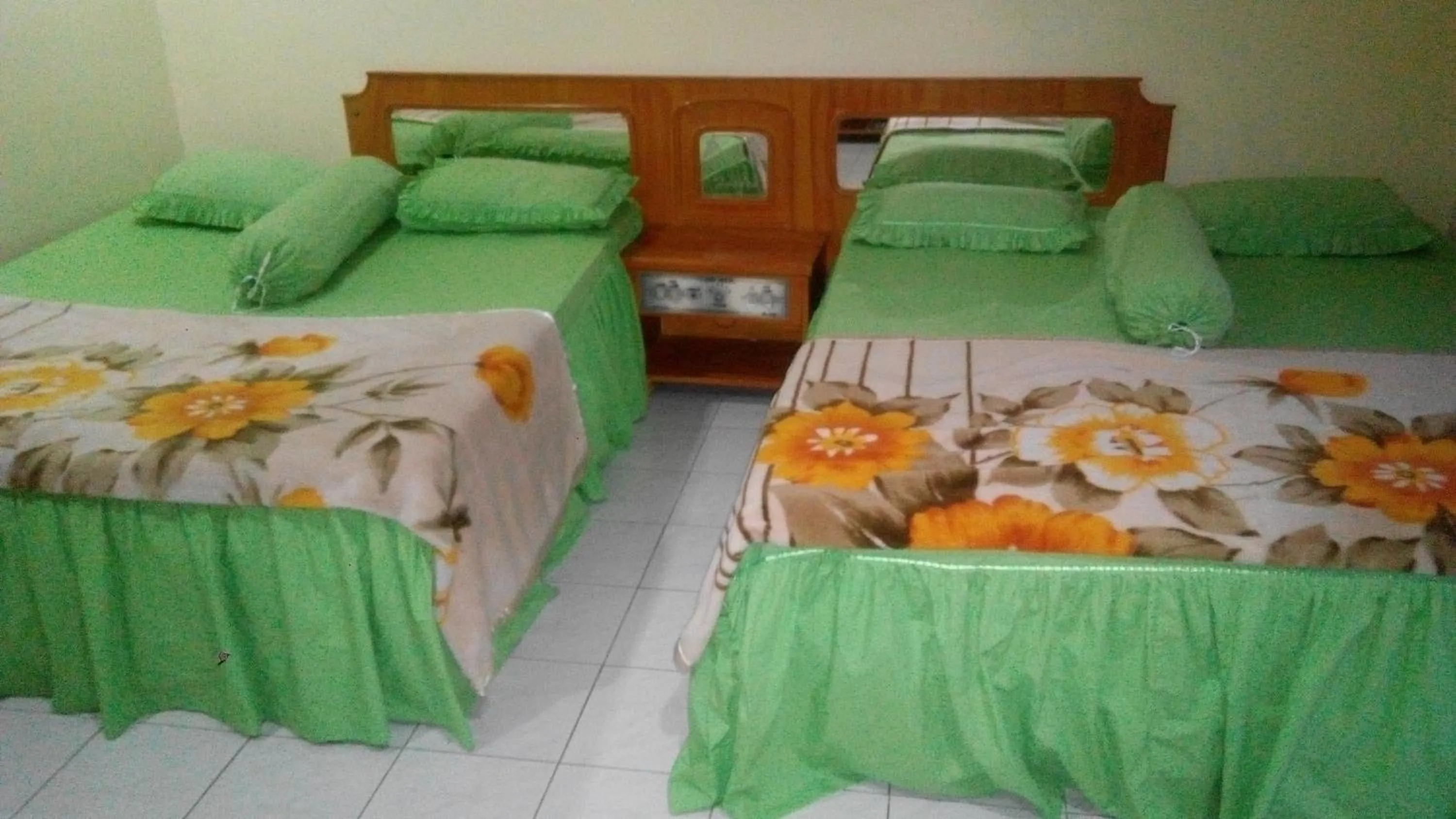 Bed in Melissa Palace Hotel and Karaoke