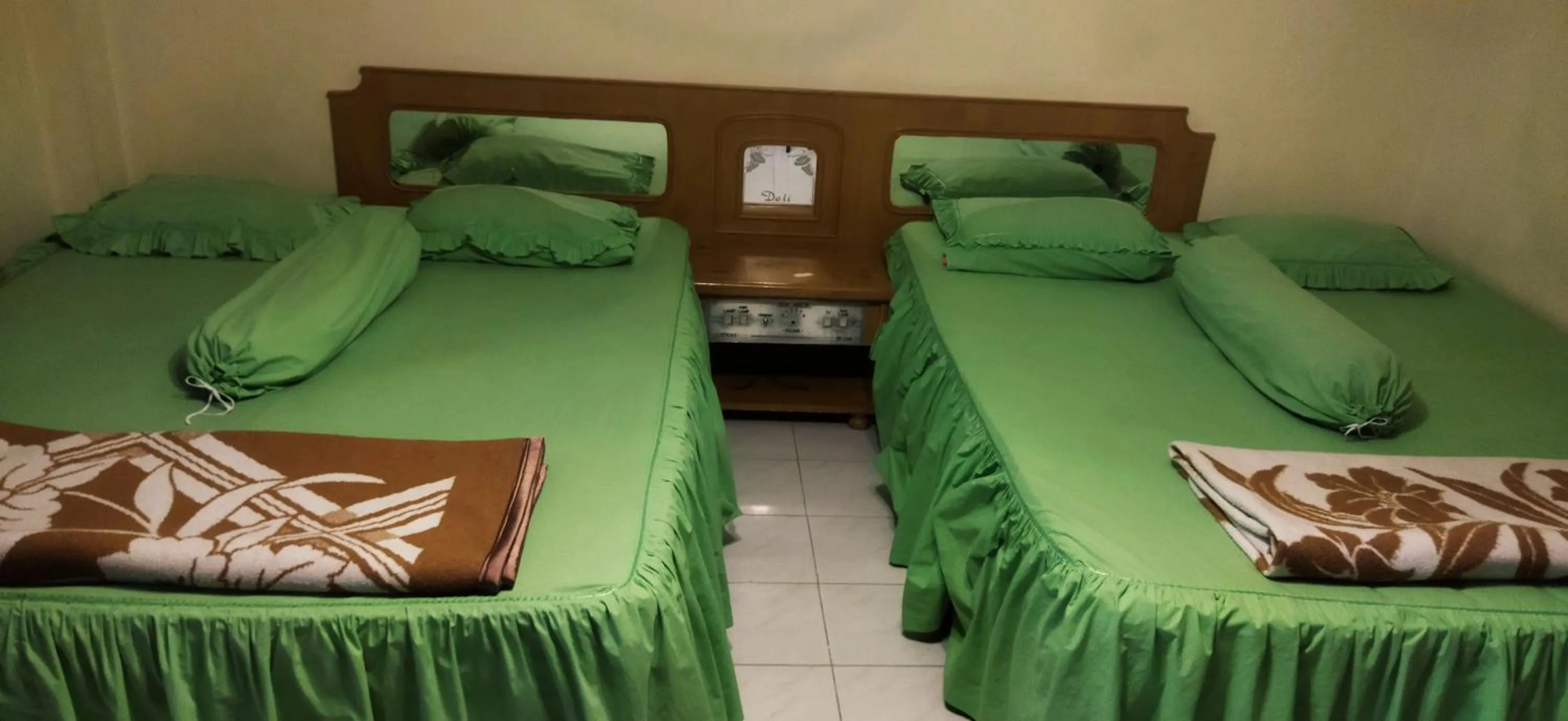 Bed in Melissa Palace Hotel and Karaoke