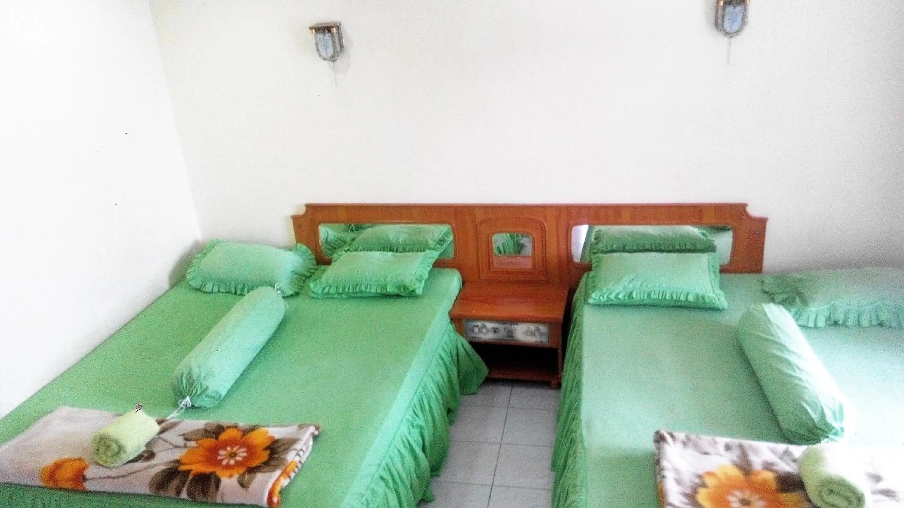 Bed in Melissa Palace Hotel and Karaoke