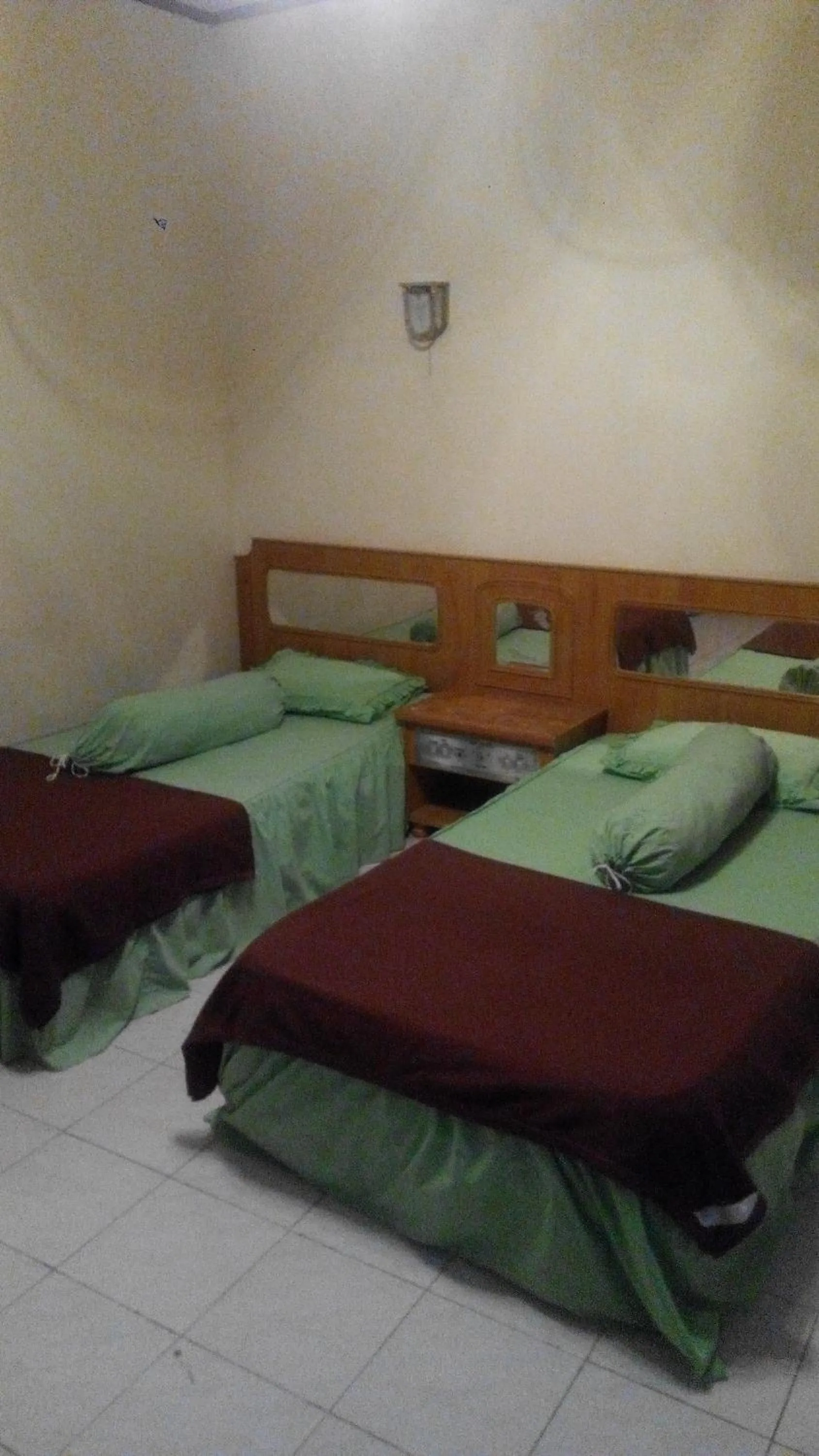 Bed in Melissa Palace Hotel and Karaoke