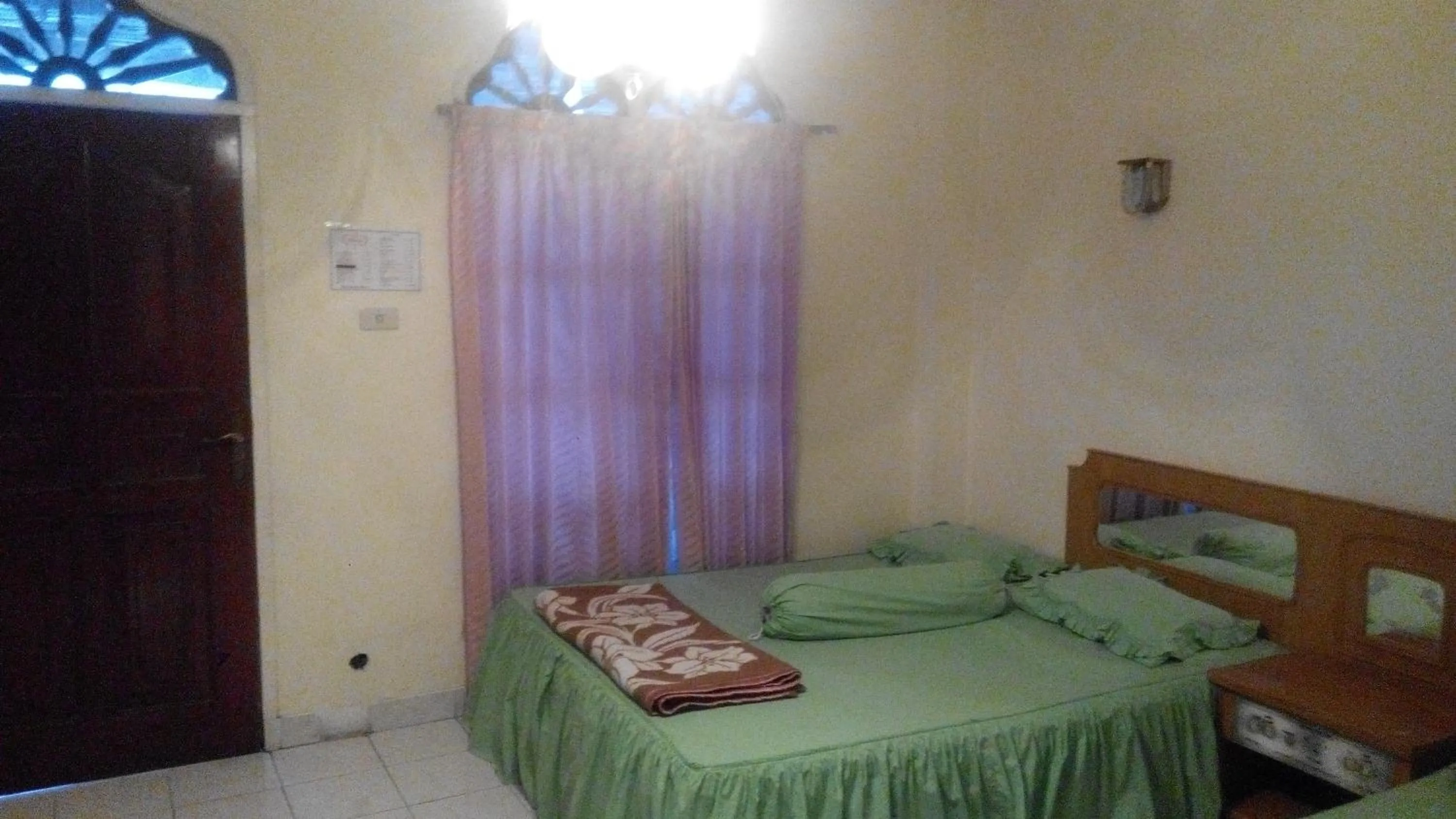 Bed in Melissa Palace Hotel and Karaoke