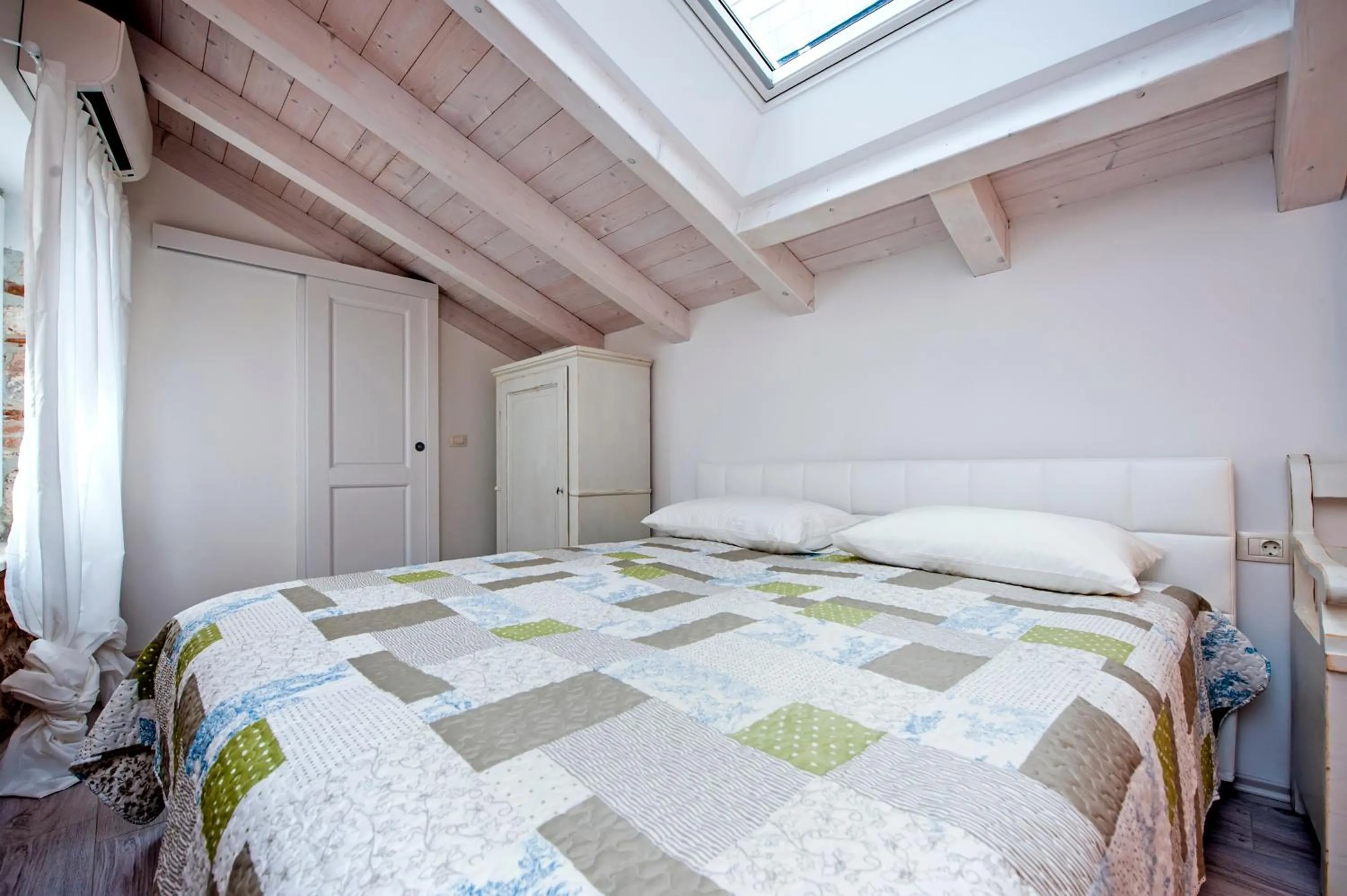 Bed in Apartment and Studio CA’ 3 VIE