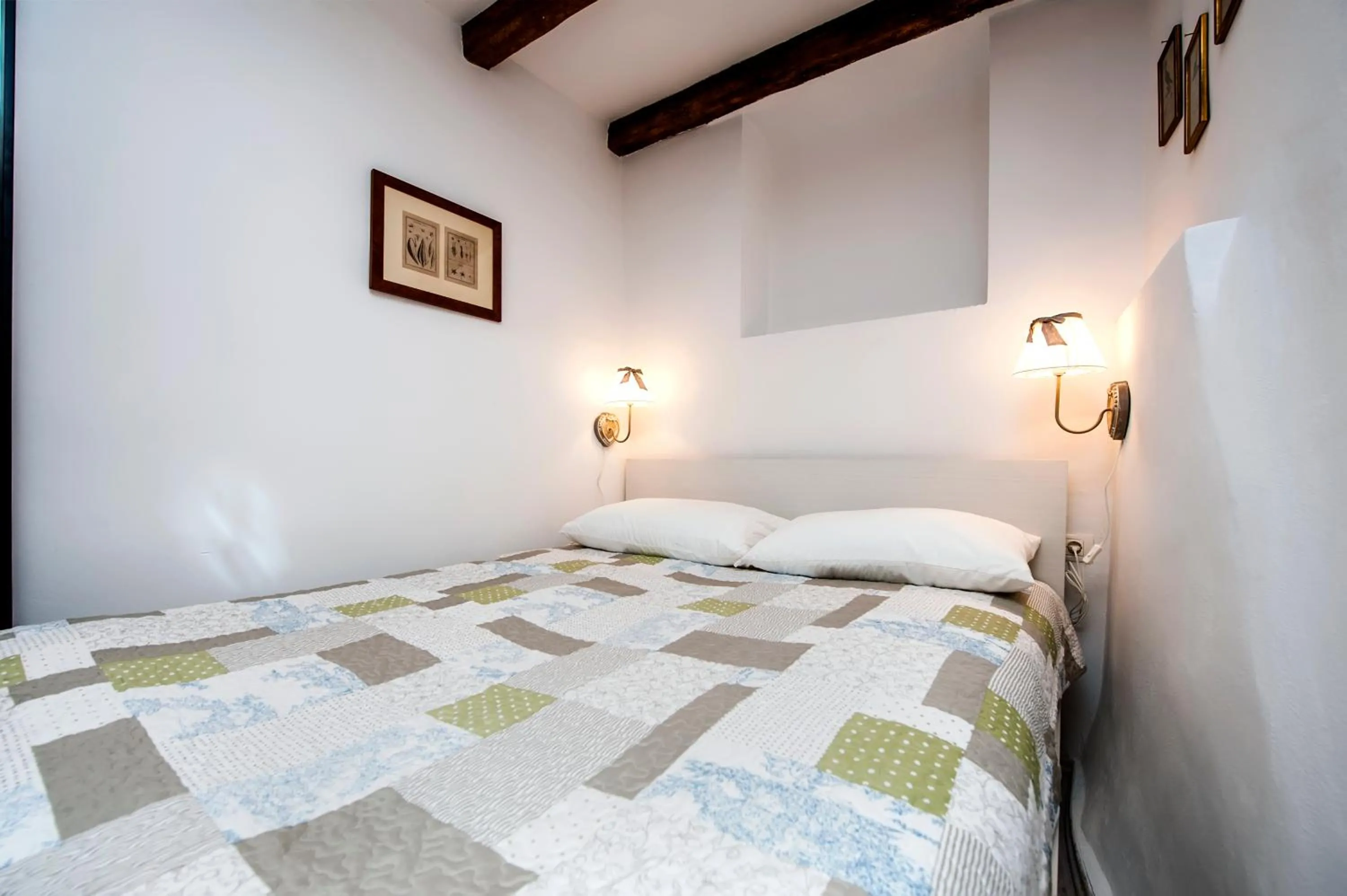 Bed in Apartment and Studio CA’ 3 VIE