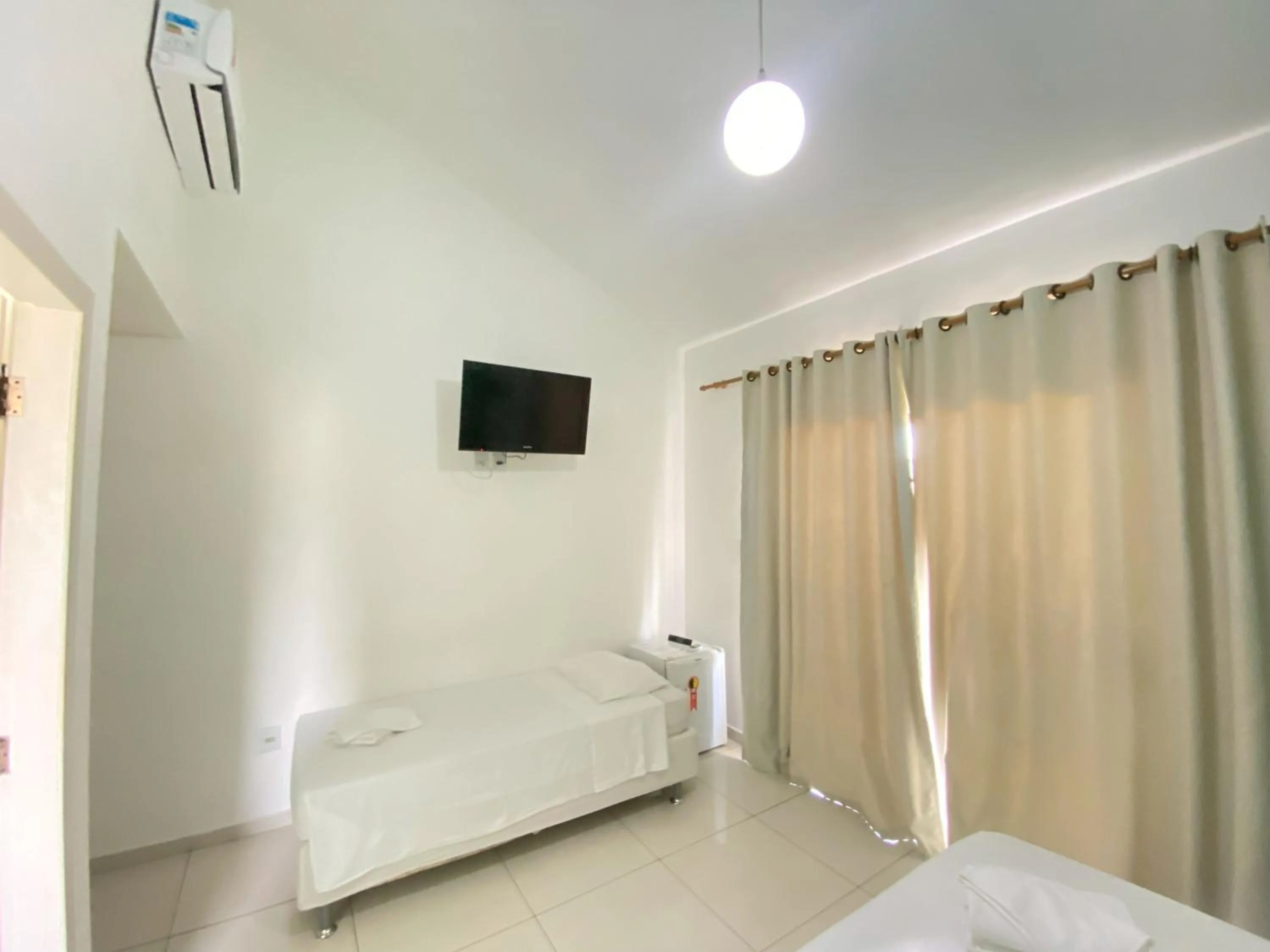 Bed in Pousada Maravilha de Paraty