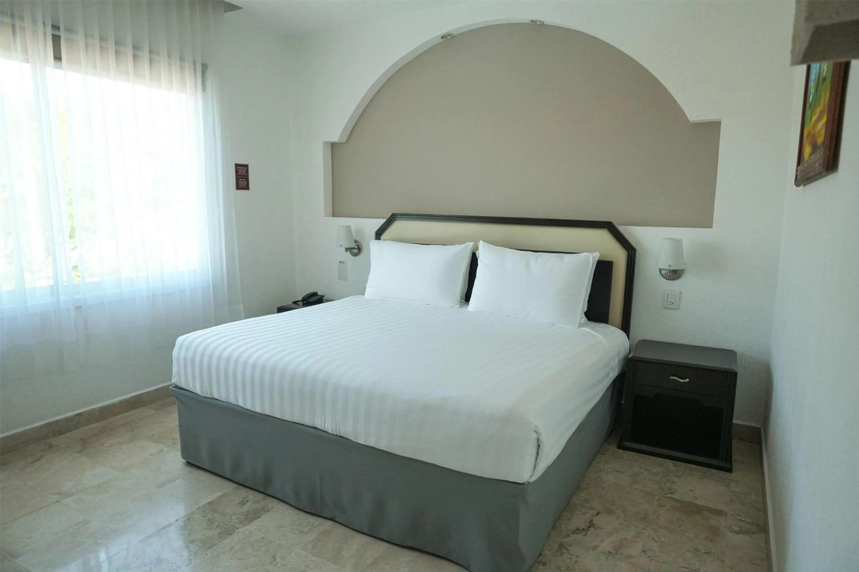 Photo of the whole room, Bed in Days Inn by Wyndham Tuxtepec