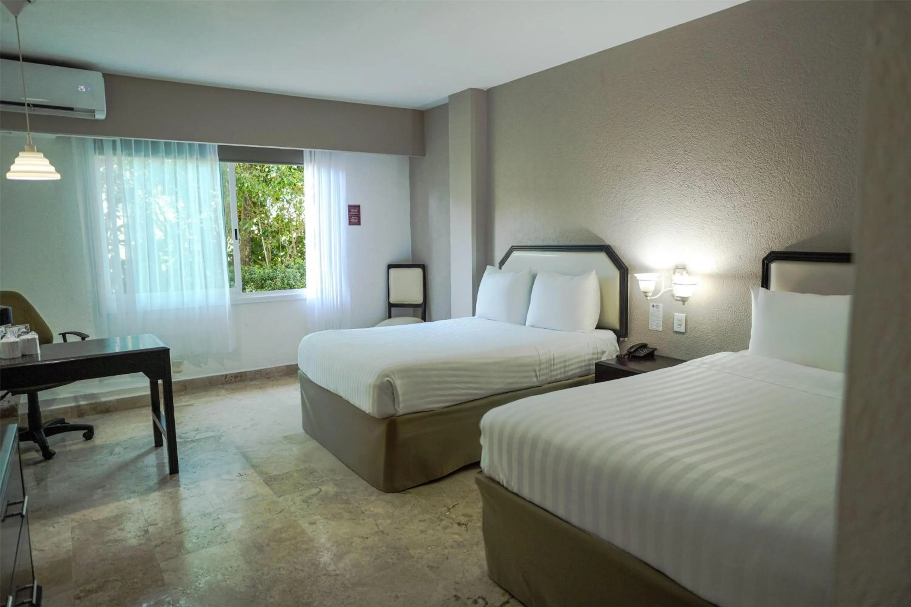 Photo of the whole room, Bed in Days Inn by Wyndham Tuxtepec