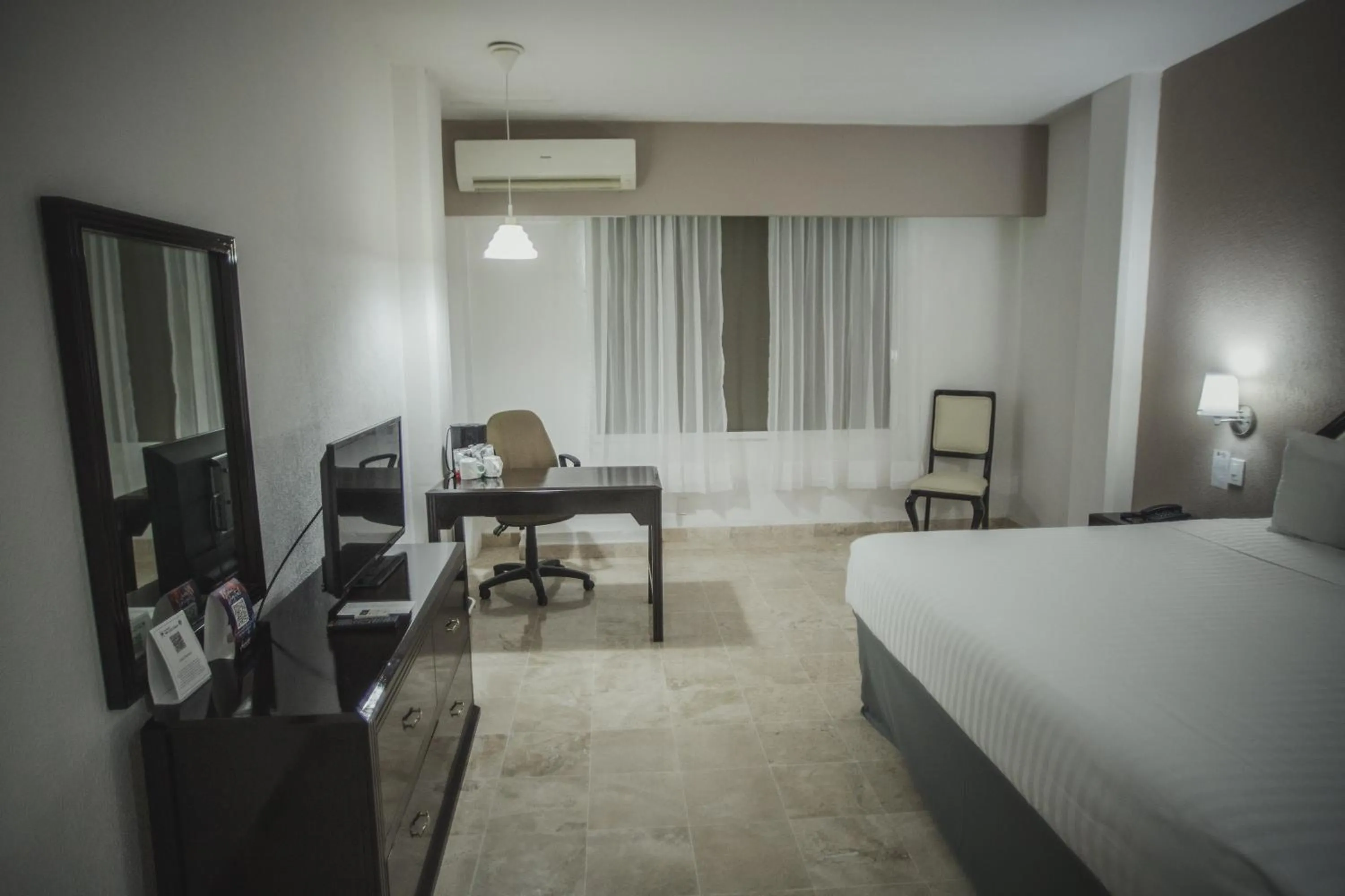 Seating area, Bed in Days Inn by Wyndham Tuxtepec