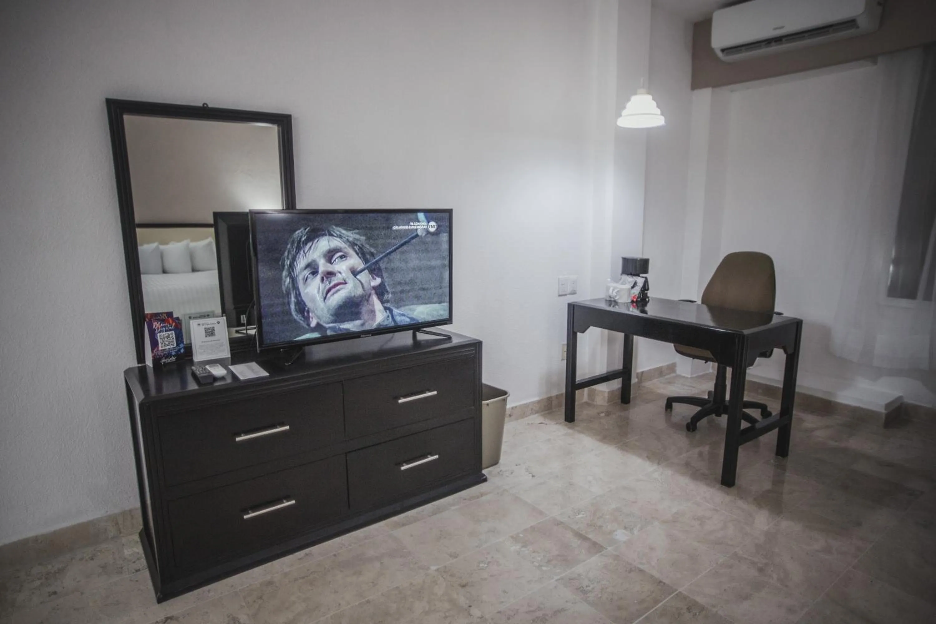 Communal lounge/ TV room in Days Inn by Wyndham Tuxtepec