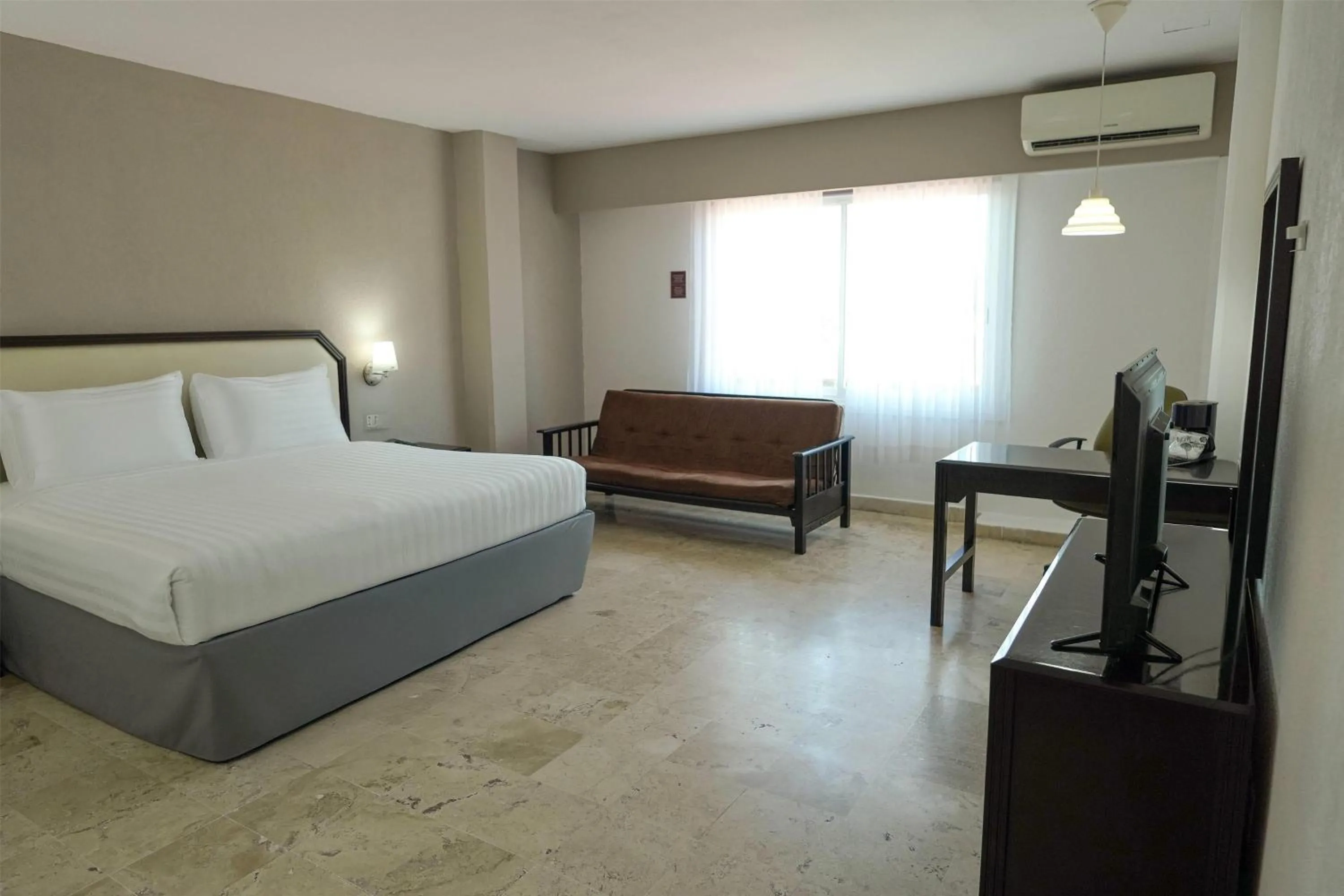 Photo of the whole room, Bed in Days Inn by Wyndham Tuxtepec