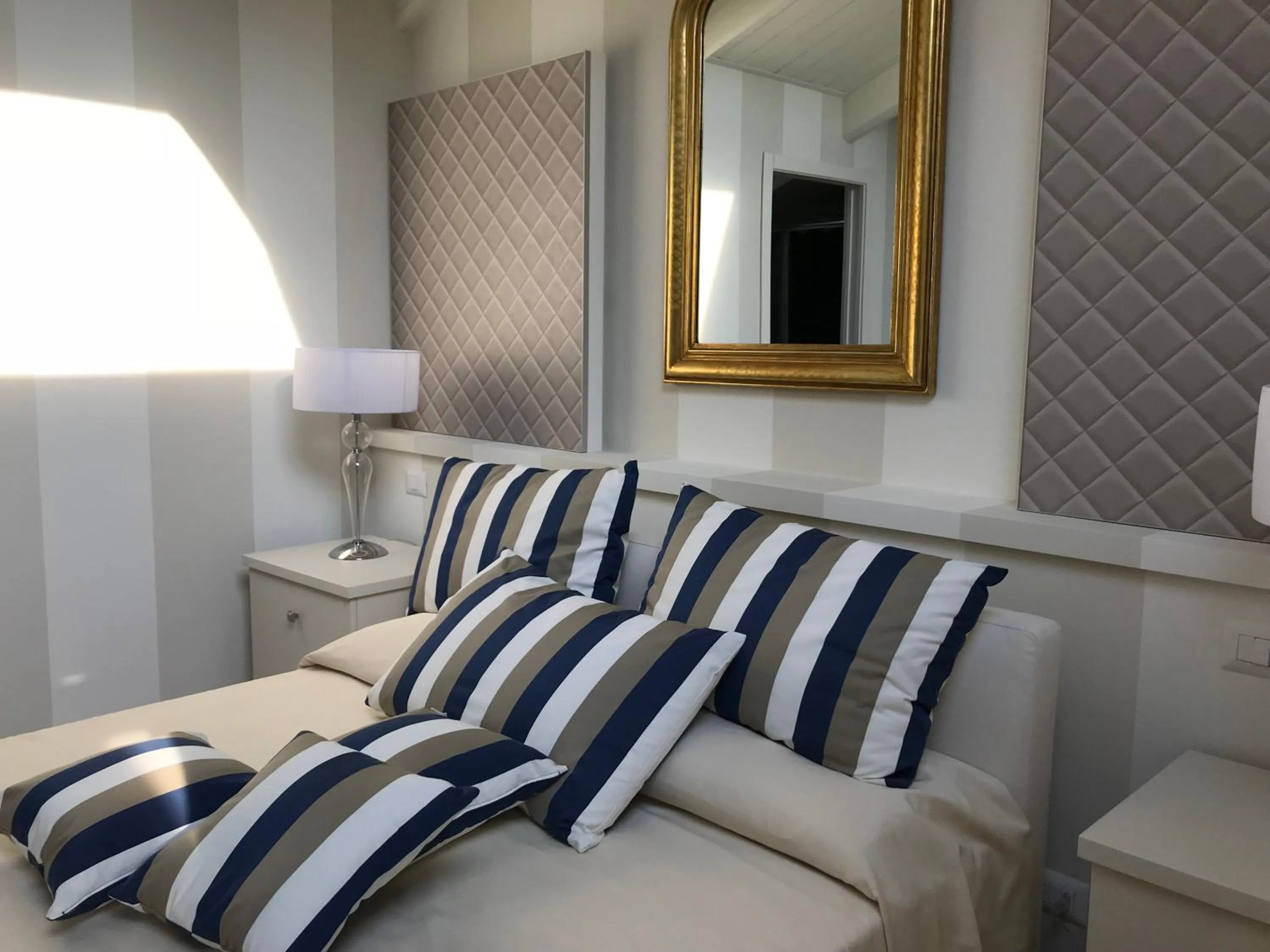 Bed in Maison Petit Perlage B&B and Champagne