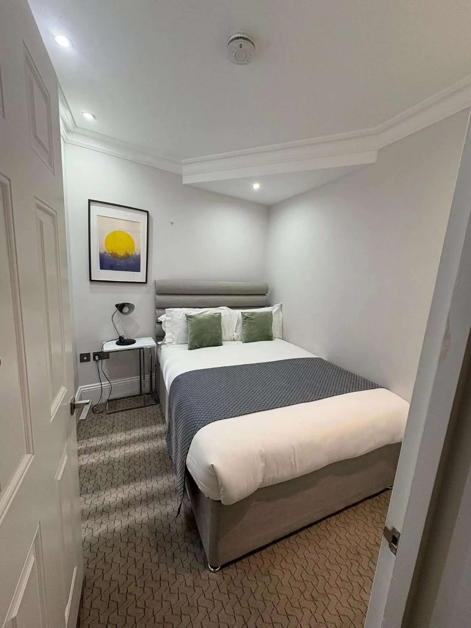 Bed in Commodore Hotel