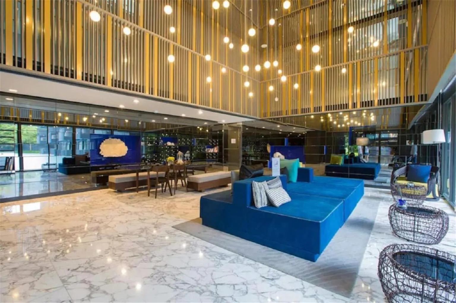 Communal lounge/ TV room in The Deck Patong by VIP