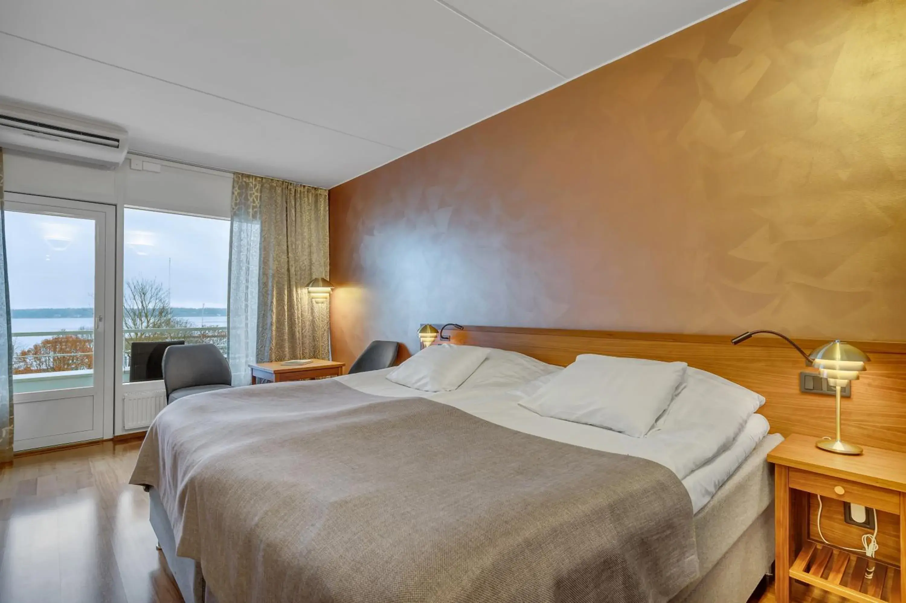 Photo of the whole room, Bed in Hotel Arkipelag Photo of the whole room, Bed in Hotel Arkipelag