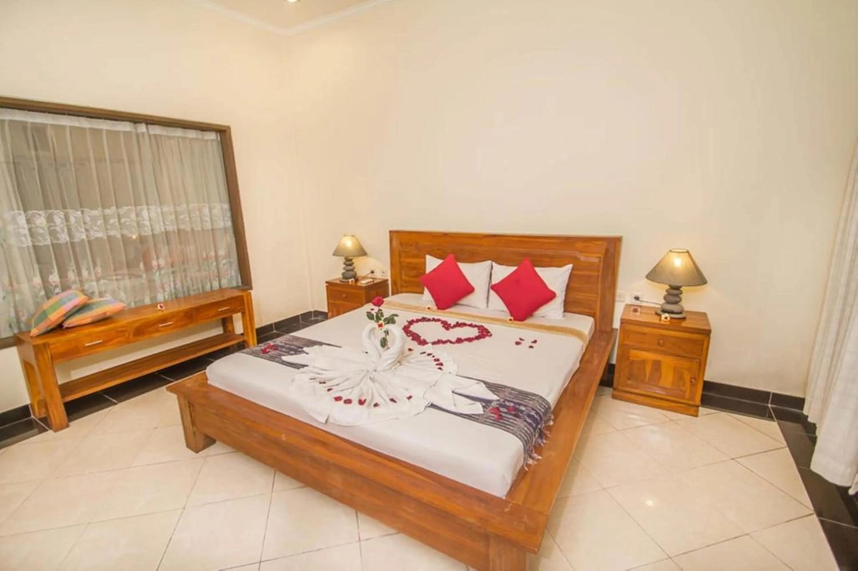 Bed in Adi Jaya Cottages Ubud Suites by EPS - CHSE Certified