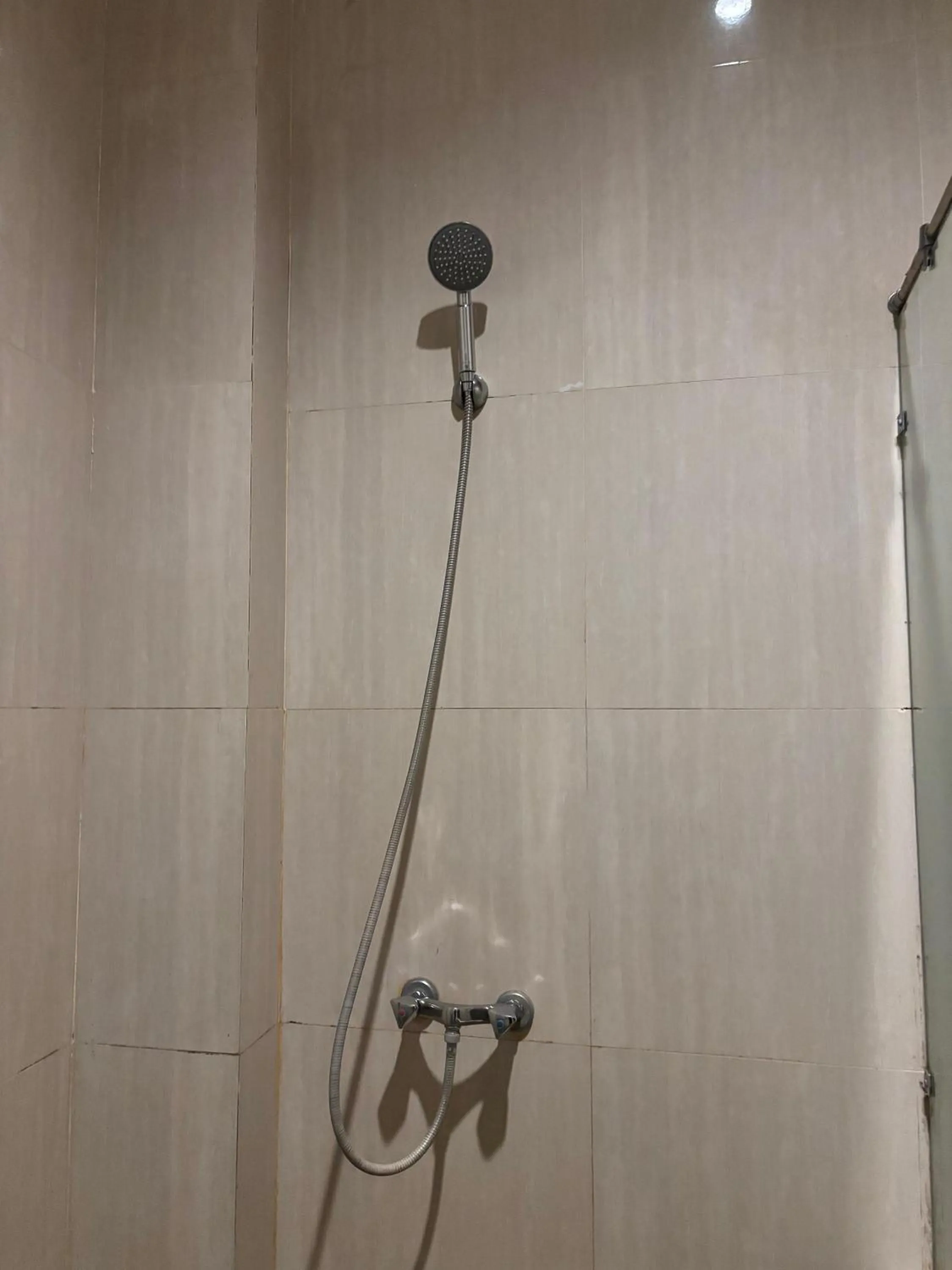 Shower in Adi Jaya Cottages Ubud Suites by EPS - CHSE Certified