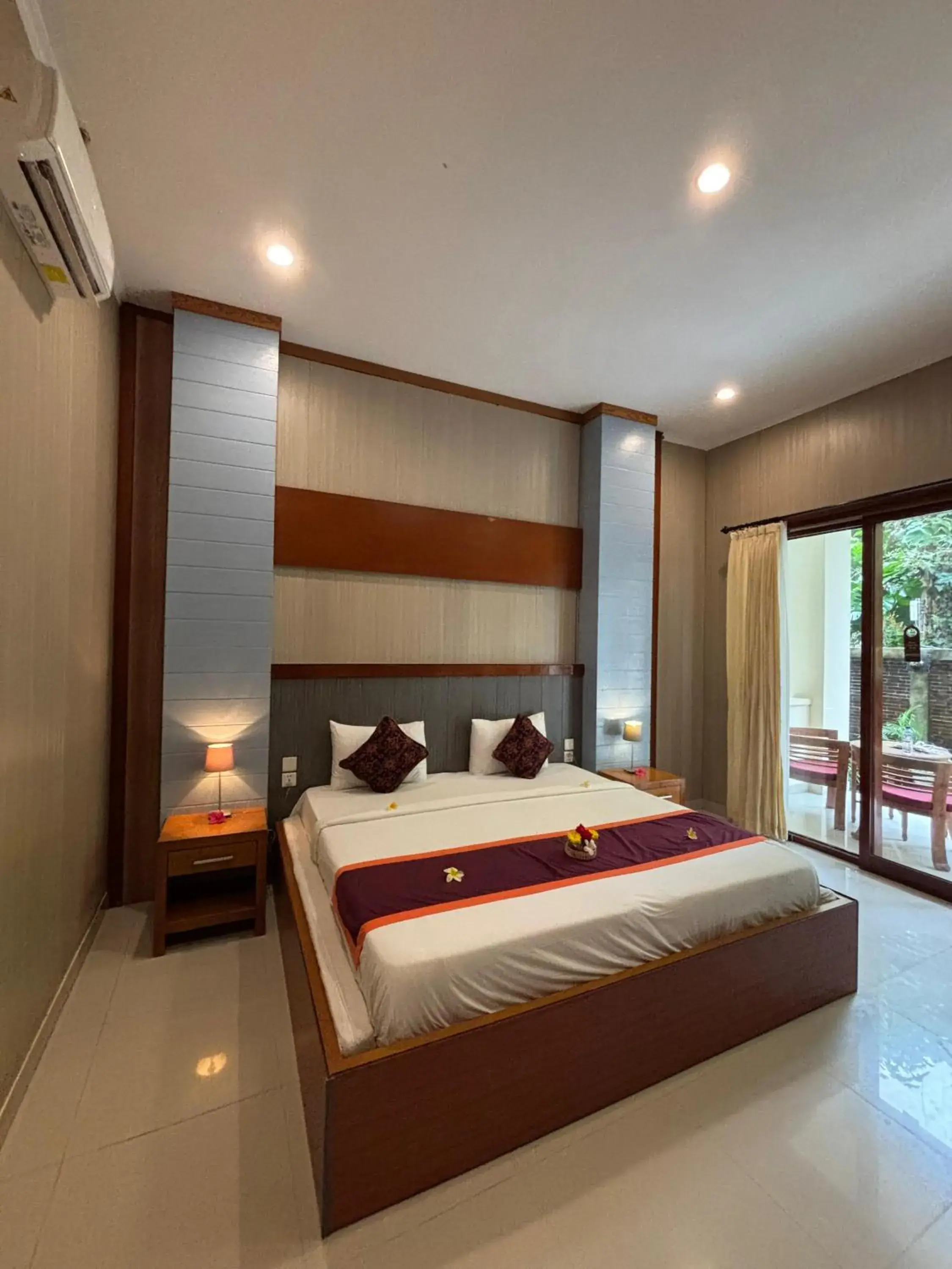 Bed in Adi Jaya Cottages Ubud Suites by EPS - CHSE Certified Bed in Adi Jaya Cottages Ubud Suites by EPS - CHSE Certified