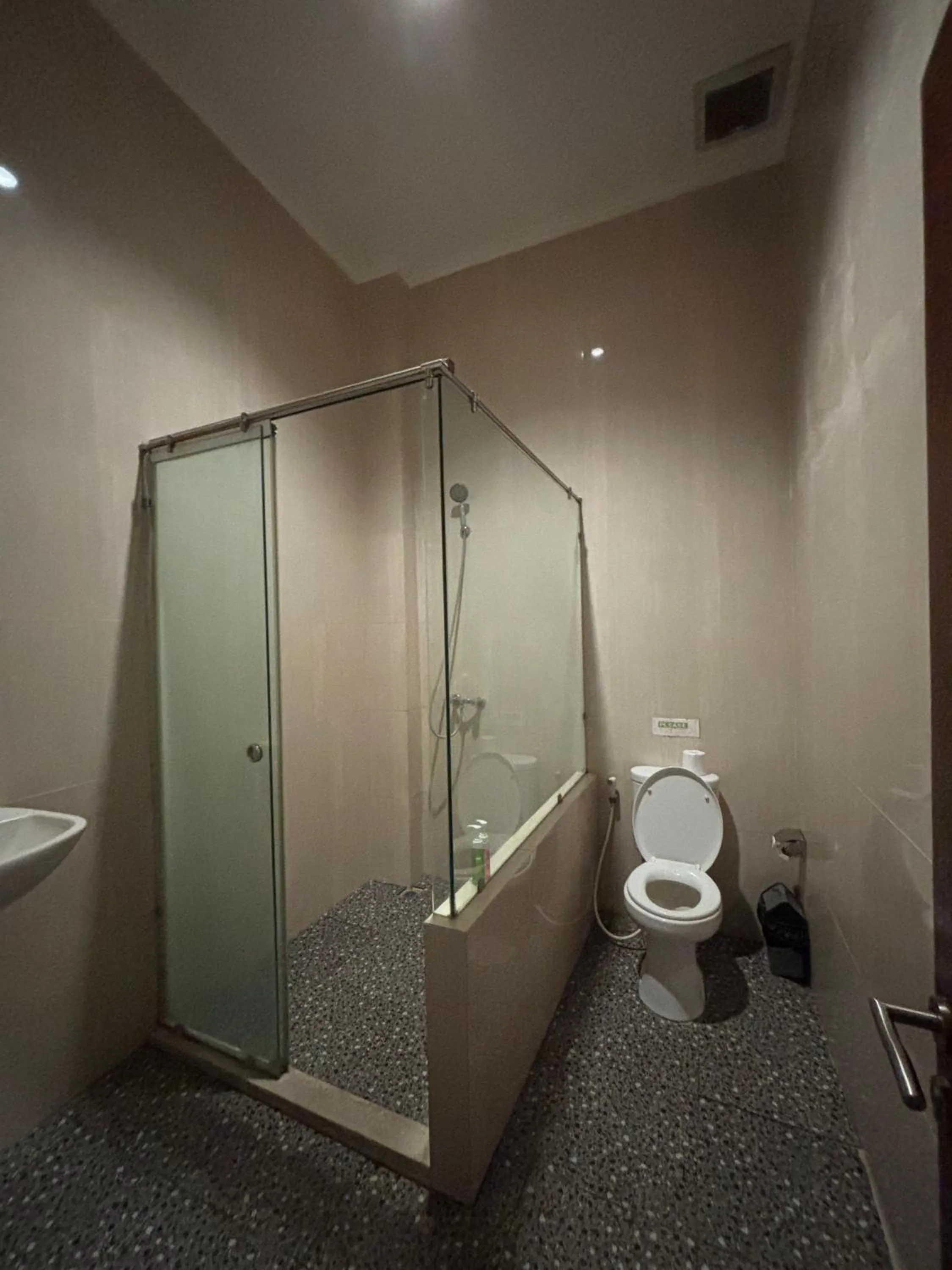 Shower in Adi Jaya Cottages Ubud Suites by EPS - CHSE Certified