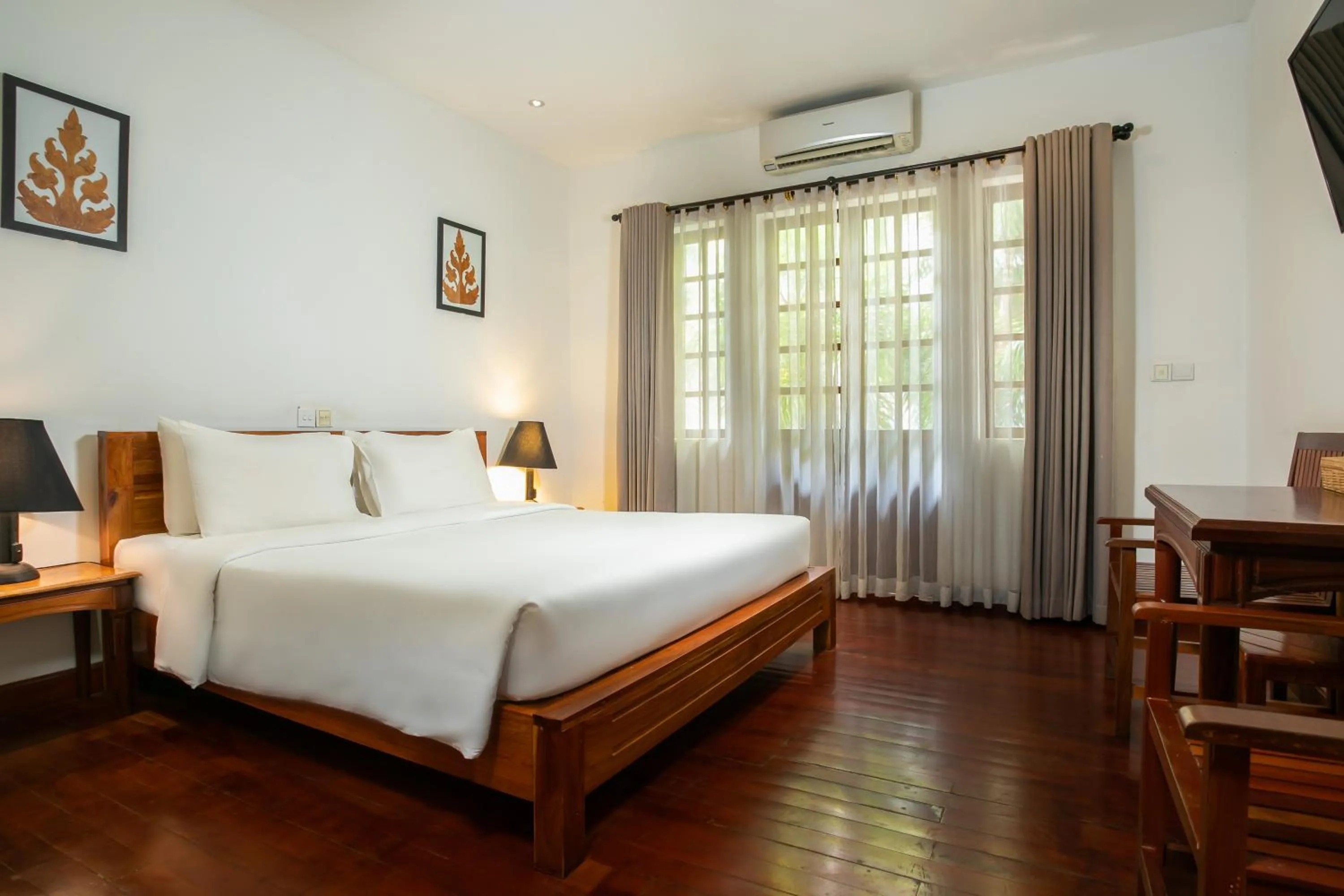 Bed in Apsara Centrepole Hotel