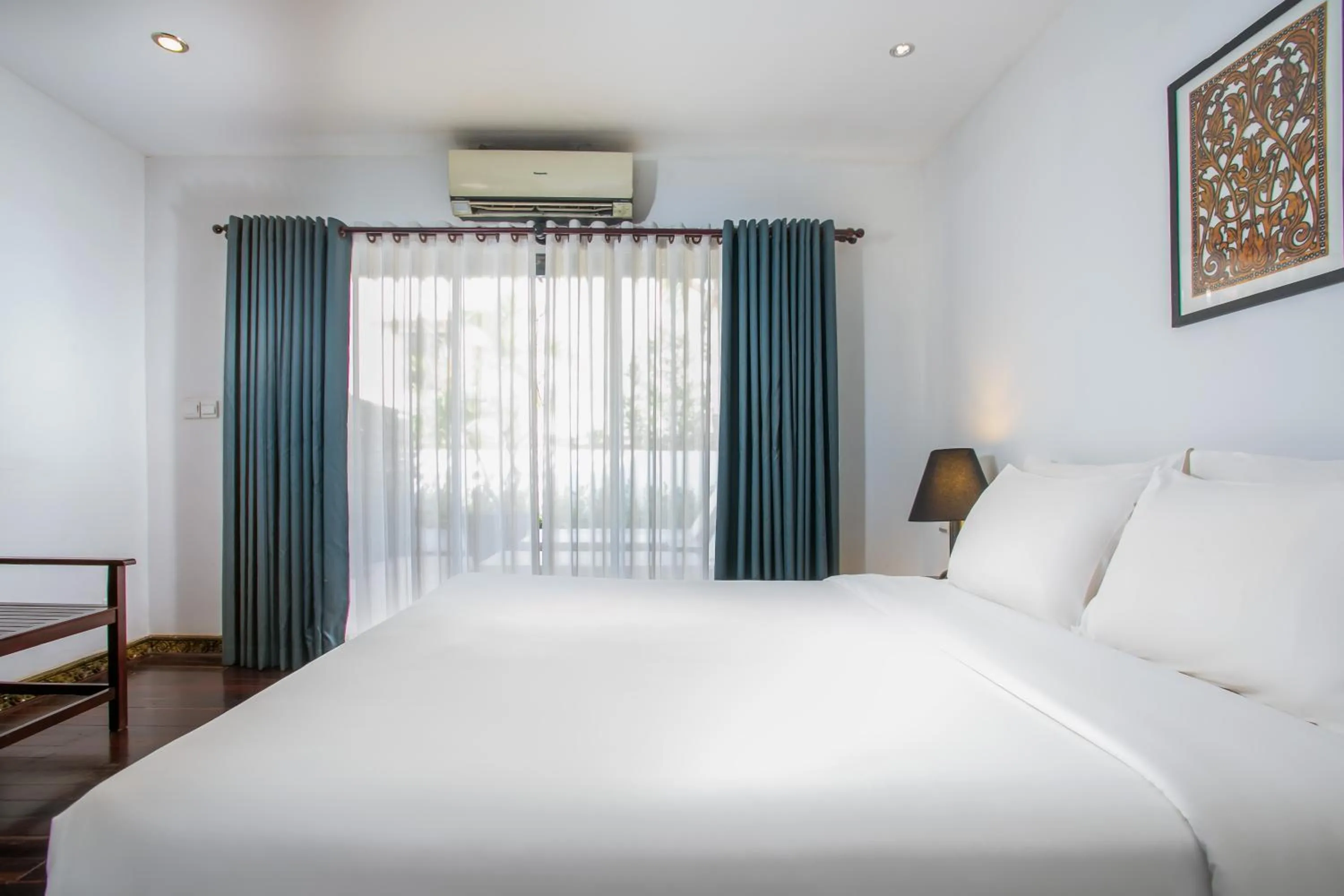 Bed in Apsara Centrepole Hotel