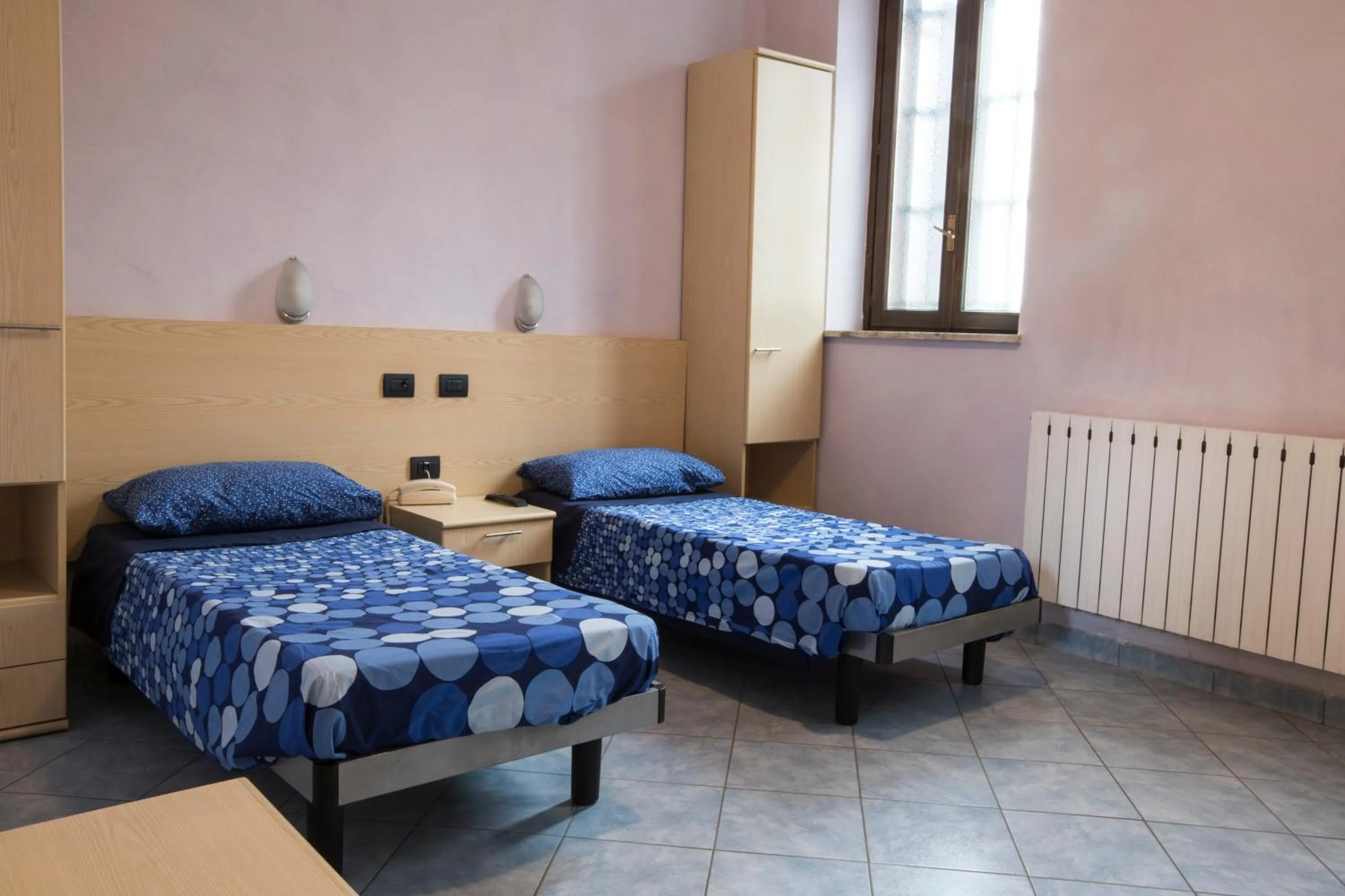 Bedroom in Albergo Ristorante Brera