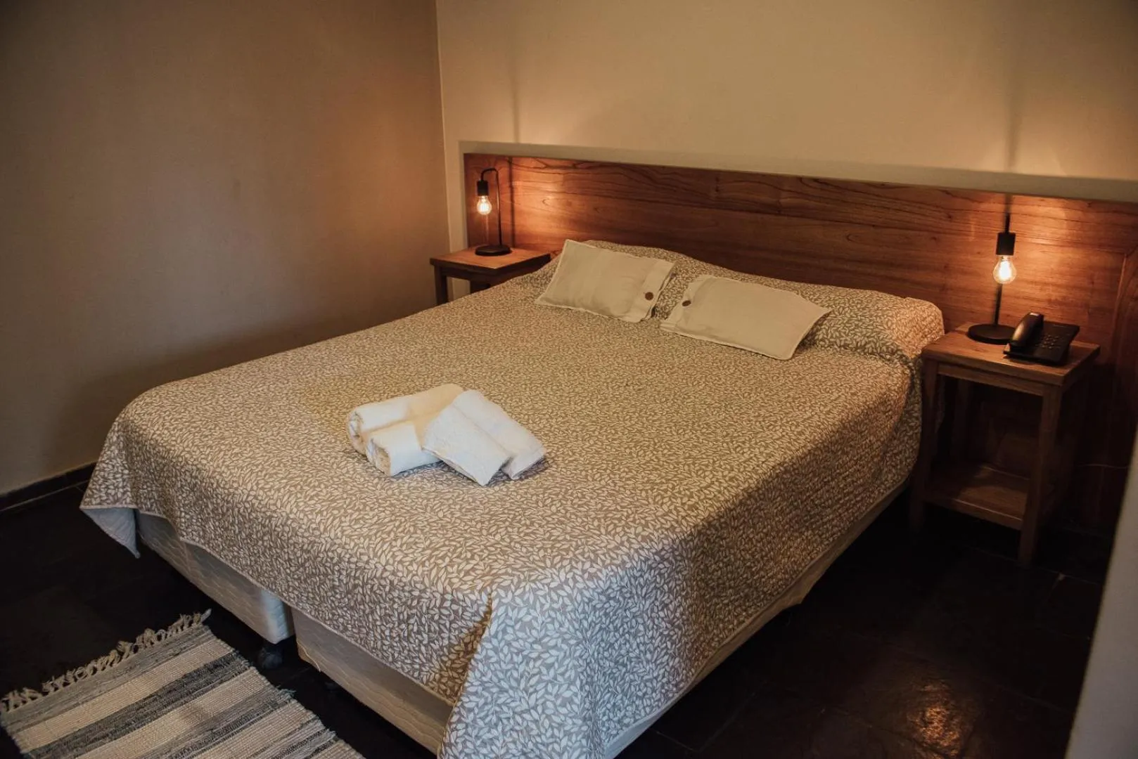 Bed in El Refugio Hotel