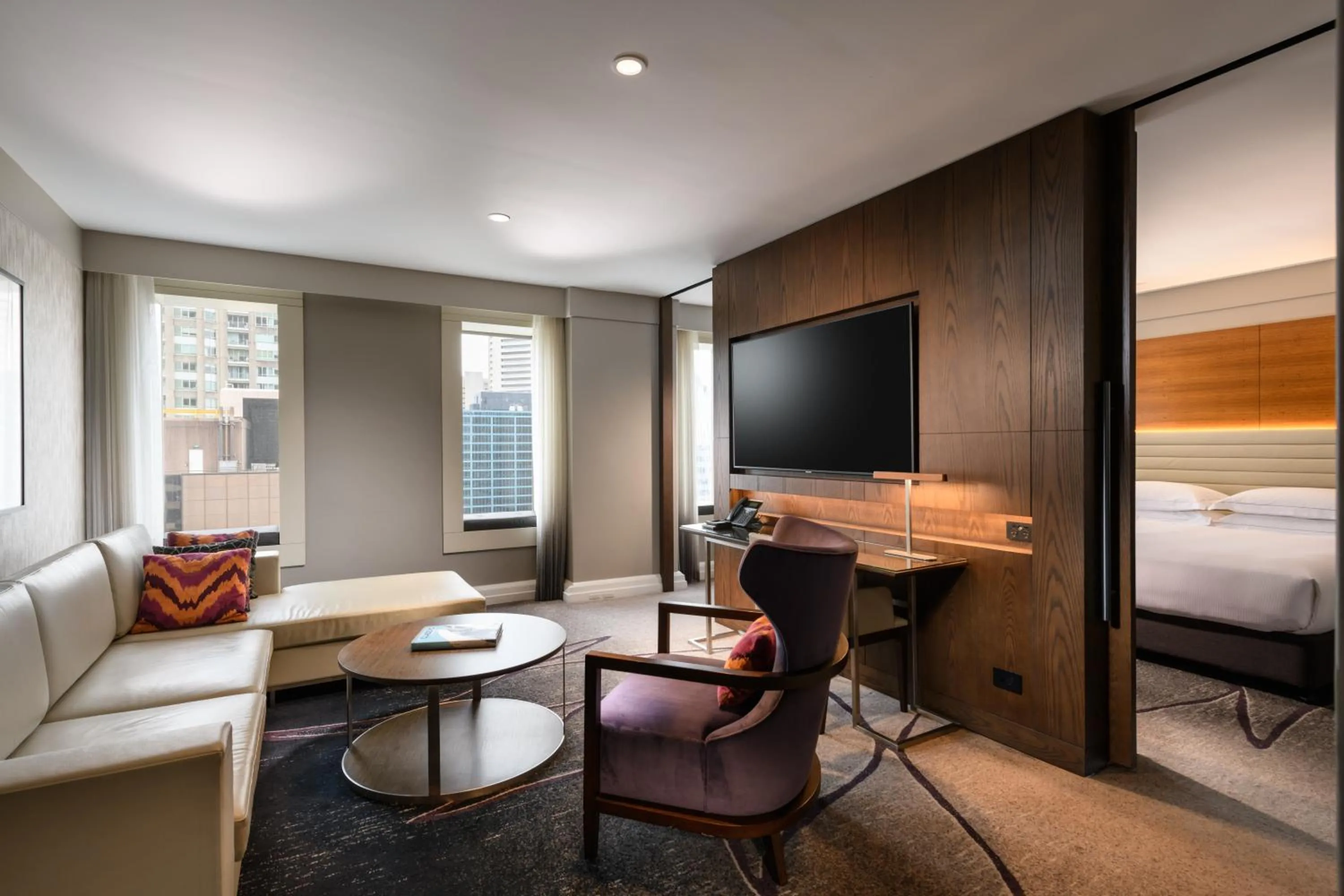 Communal lounge/ TV room, Bed in Hilton Sydney