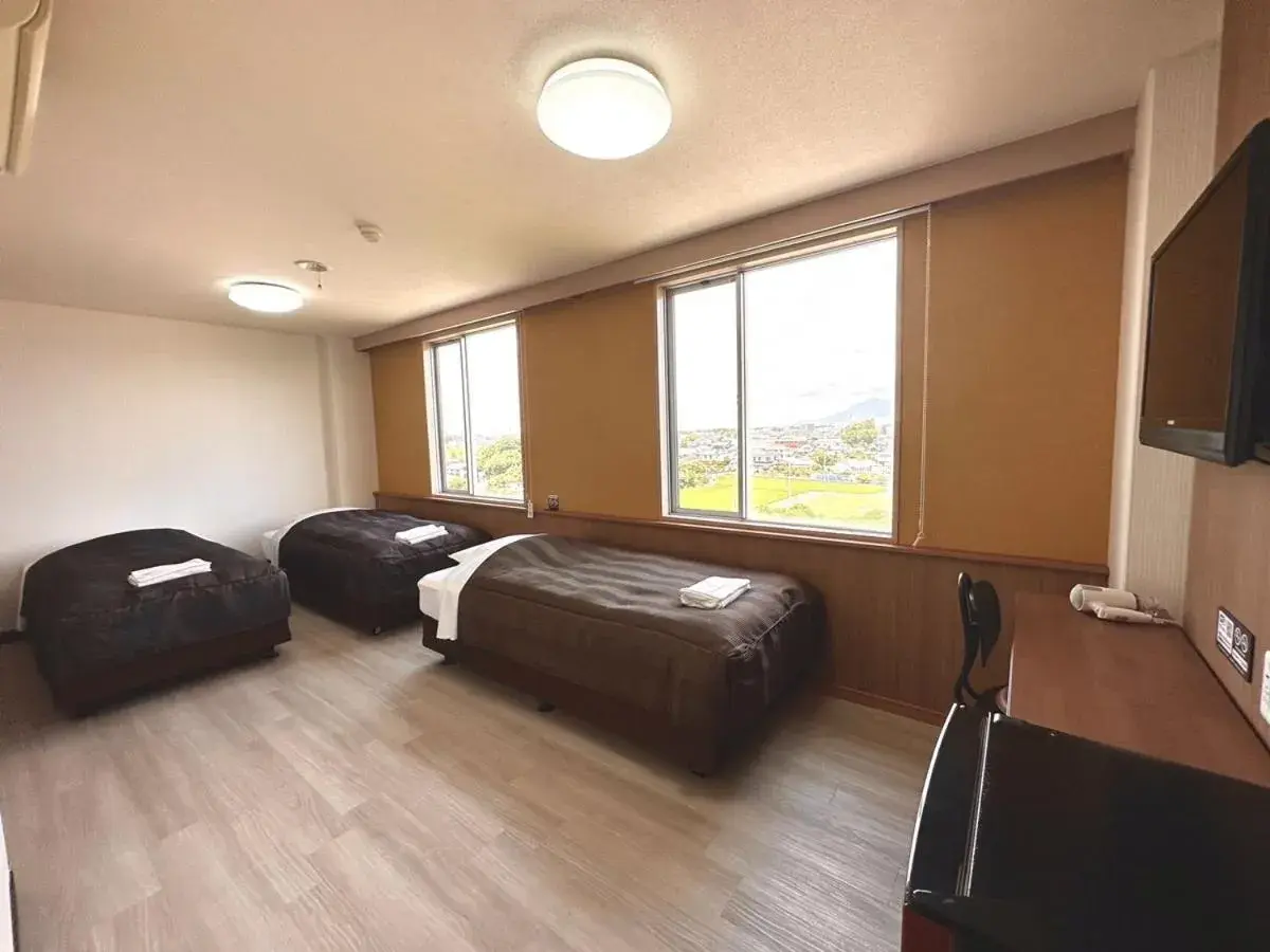 Bed in Tabist Tsukuba Sky Hotel Bed in Tabist Tsukuba Sky Hotel