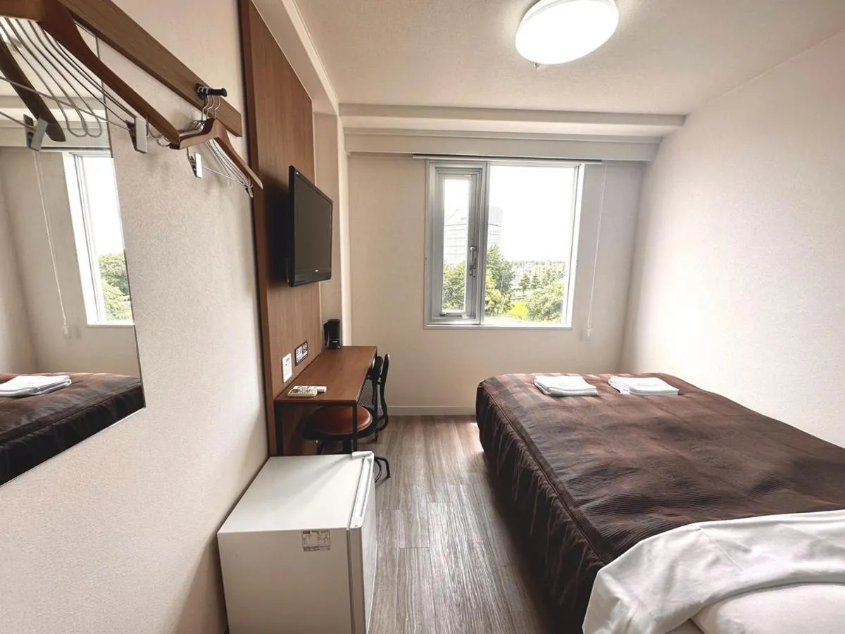 Bed in Tabist Tsukuba Sky Hotel