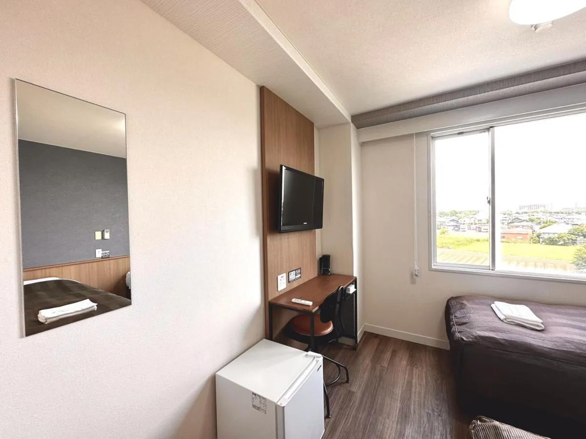 Bed in Tabist Tsukuba Sky Hotel