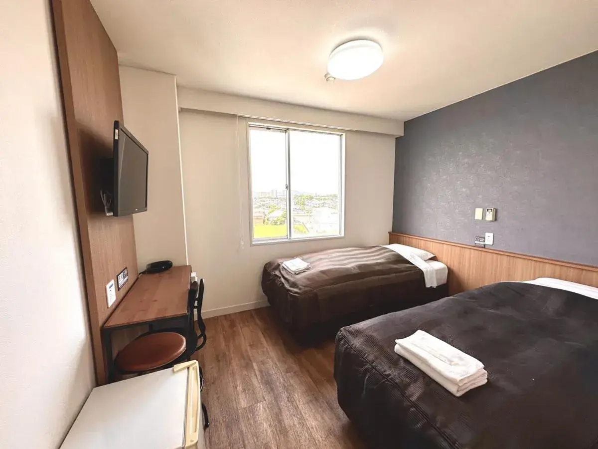 Bed in Tabist Tsukuba Sky Hotel Bed in Tabist Tsukuba Sky Hotel