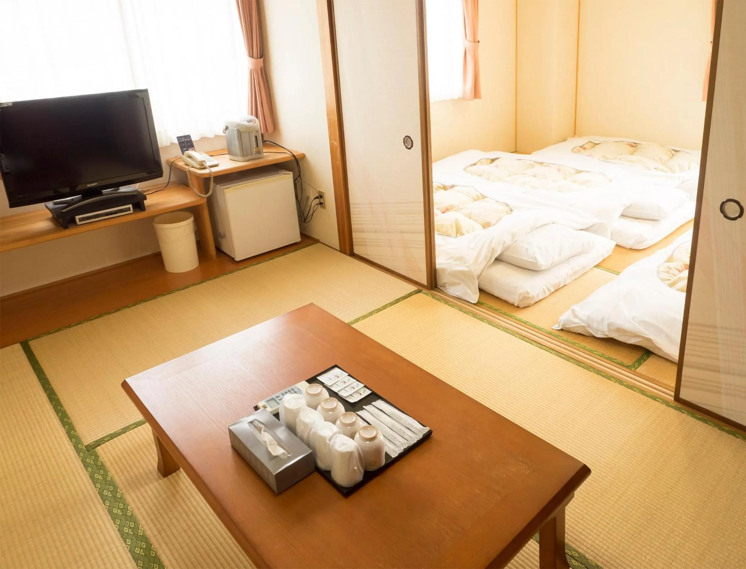 Bed in Hikone Station Hotel