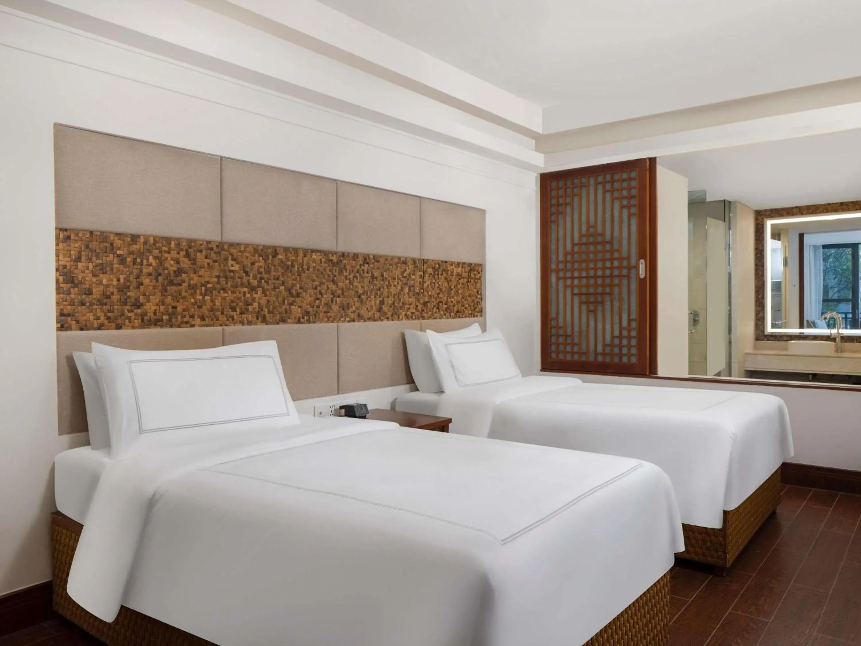 Swiss Signature Room, 2 Single Size Beds, Connect with Public Swimming Pool in Swissôtel & Spa Sanya Yalong Bay Swiss Signature Room, 2 Single Size Beds, Connect with Public Swimming Pool in Swissôtel & Spa Sanya Yalong Bay