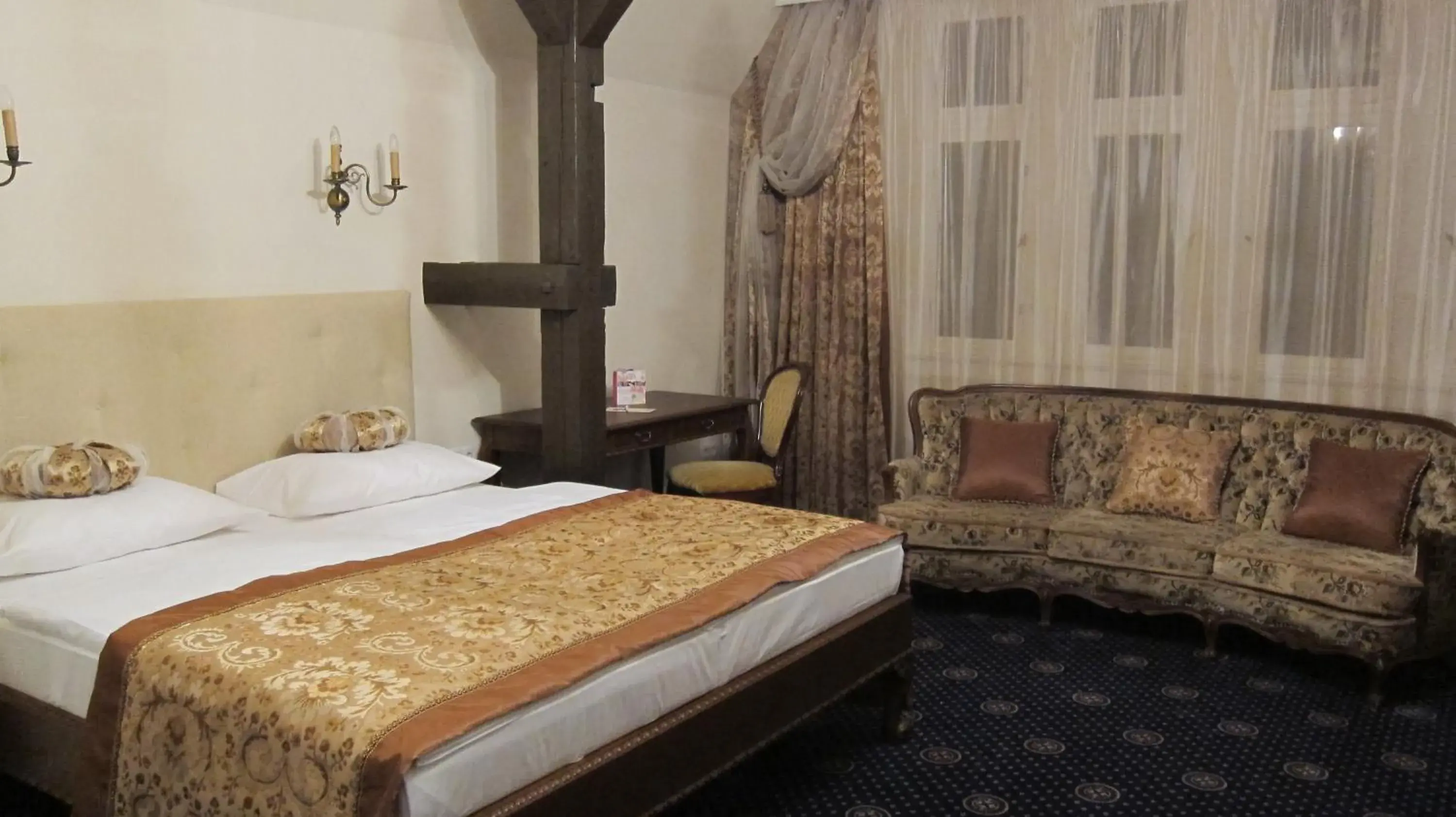 Decorative detail, Bed in Schloss Hotel Wolfsbrunnen