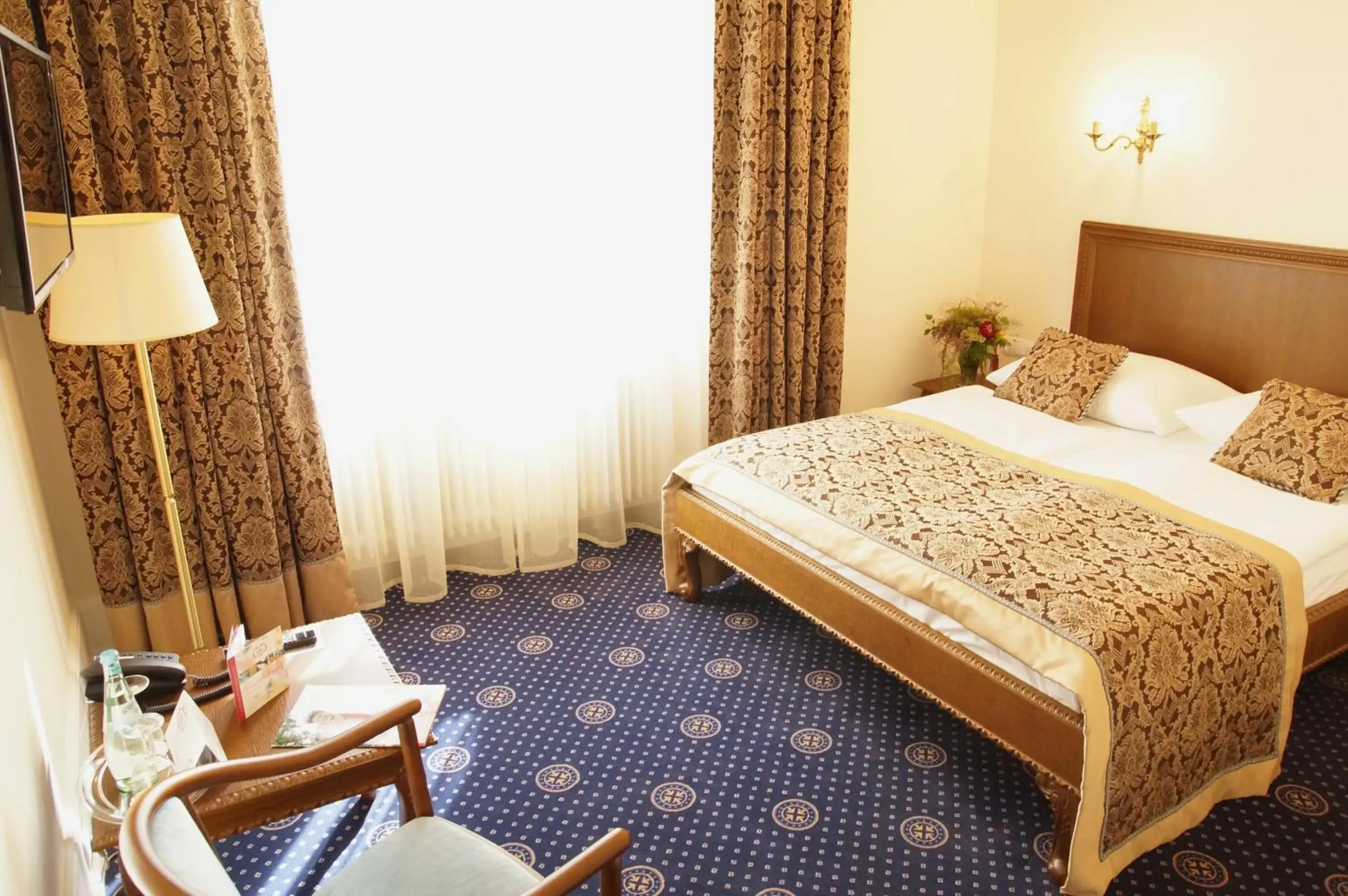 Bed in Schloss Hotel Wolfsbrunnen