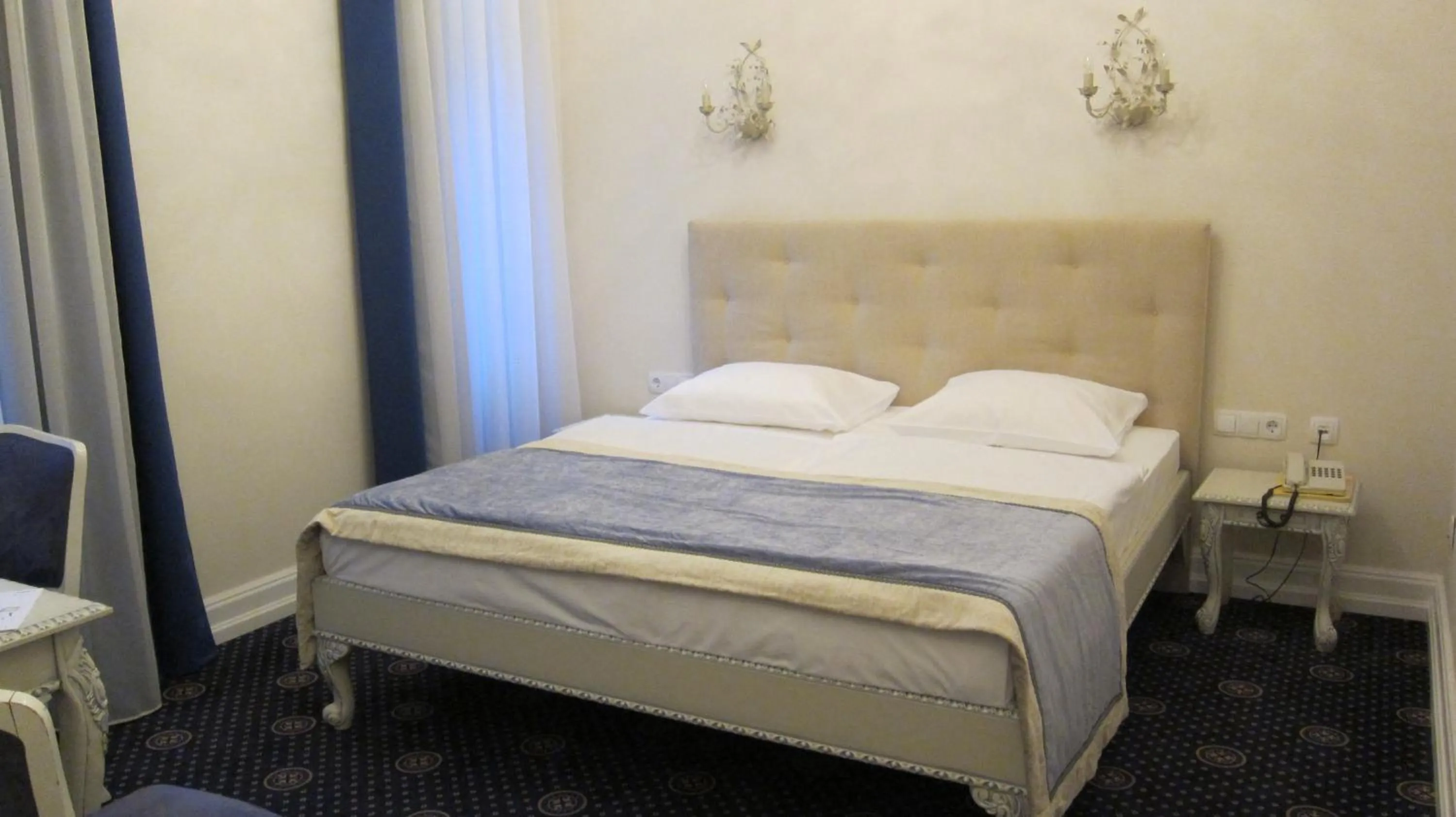 Bed in Schloss Hotel Wolfsbrunnen