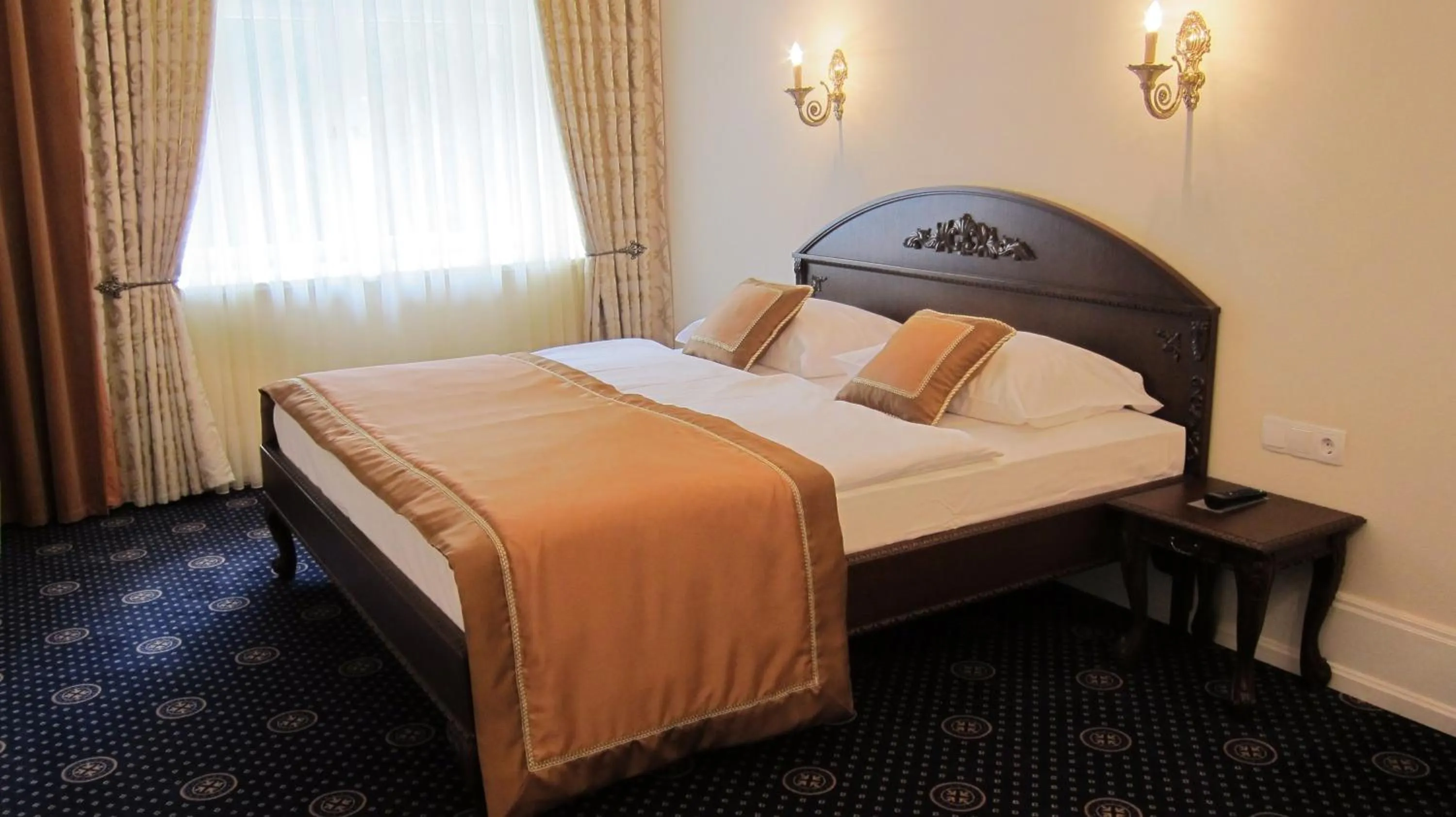 Decorative detail, Bed in Schloss Hotel Wolfsbrunnen