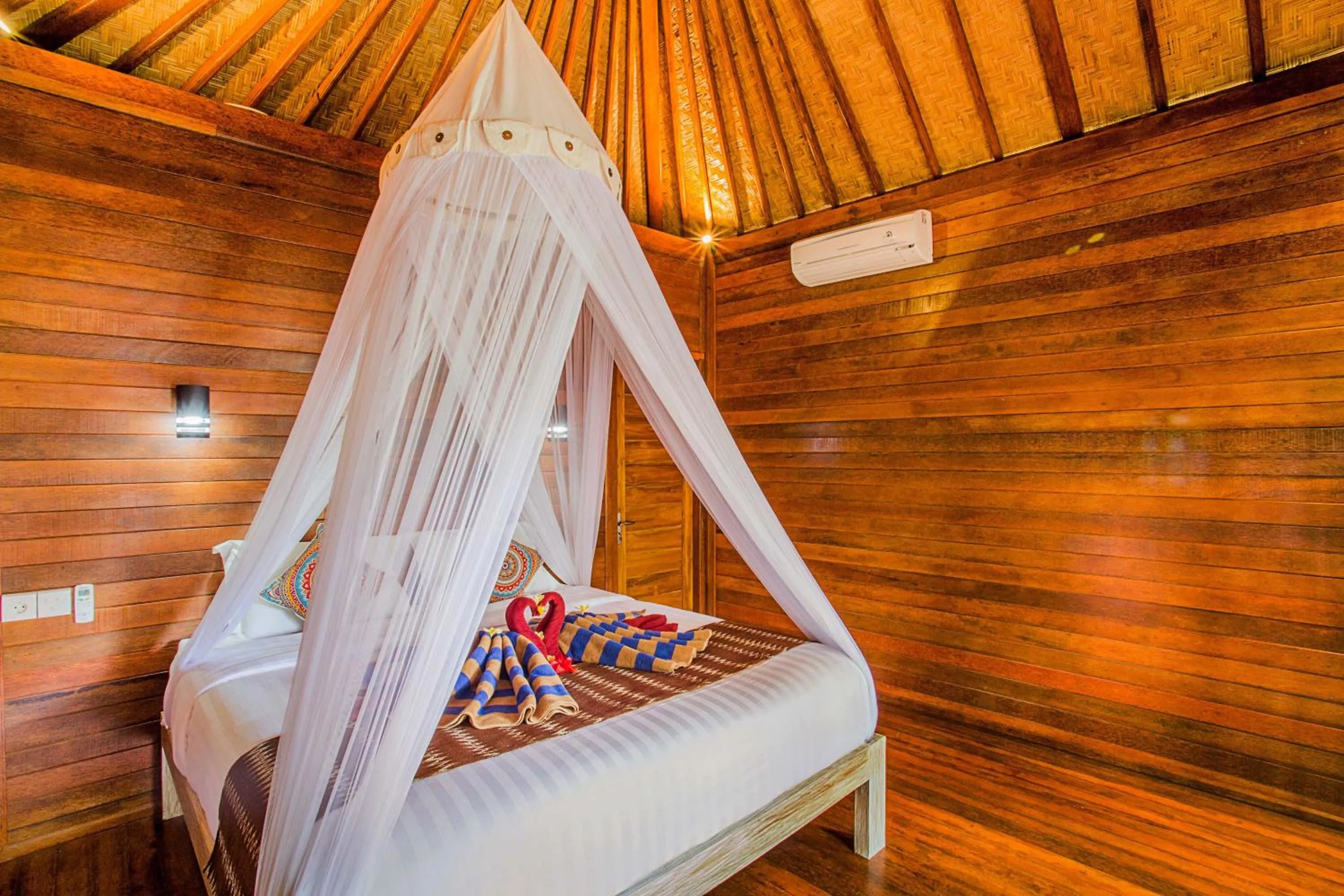 Bed in Sea Bridge Villa Ceningan