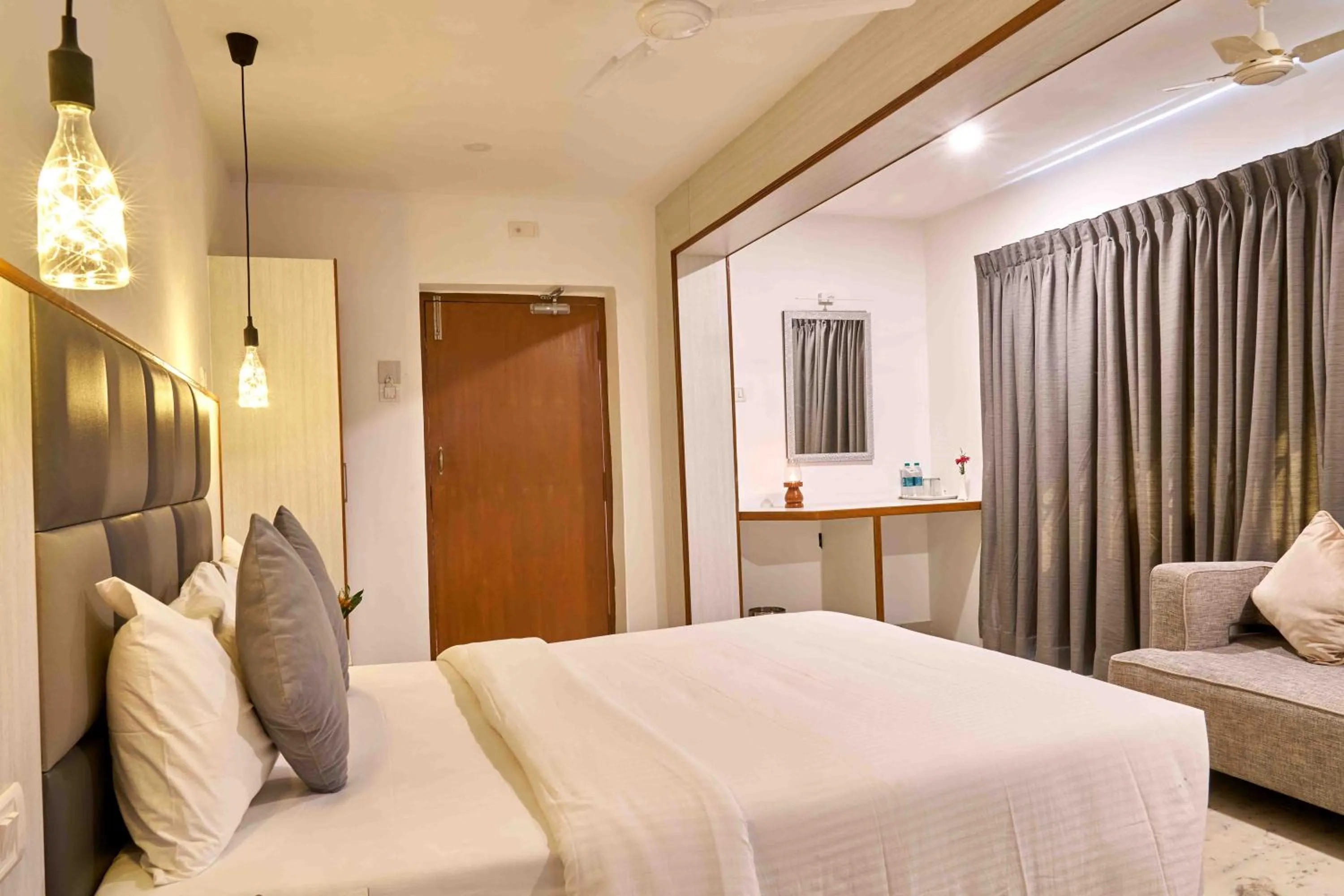 Bed in Hotel Mamallaa Heritage