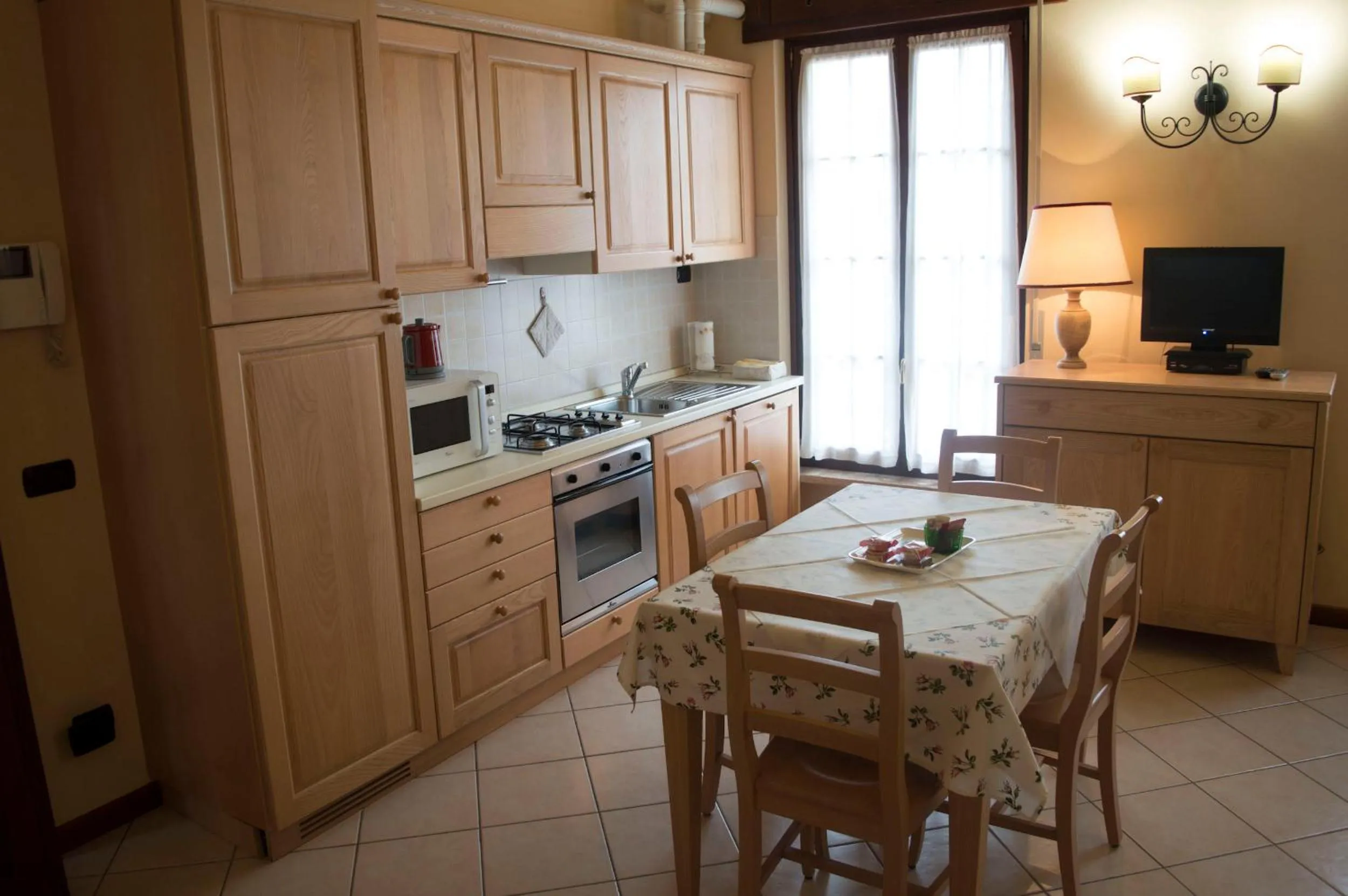 Kitchen or kitchenette in Residence Villa Mainard