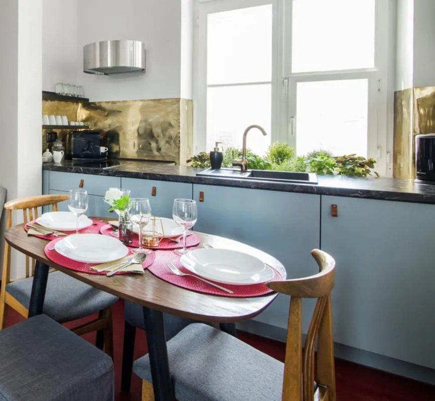 Kitchen or kitchenette in Aparthotel Nowy Świat 28