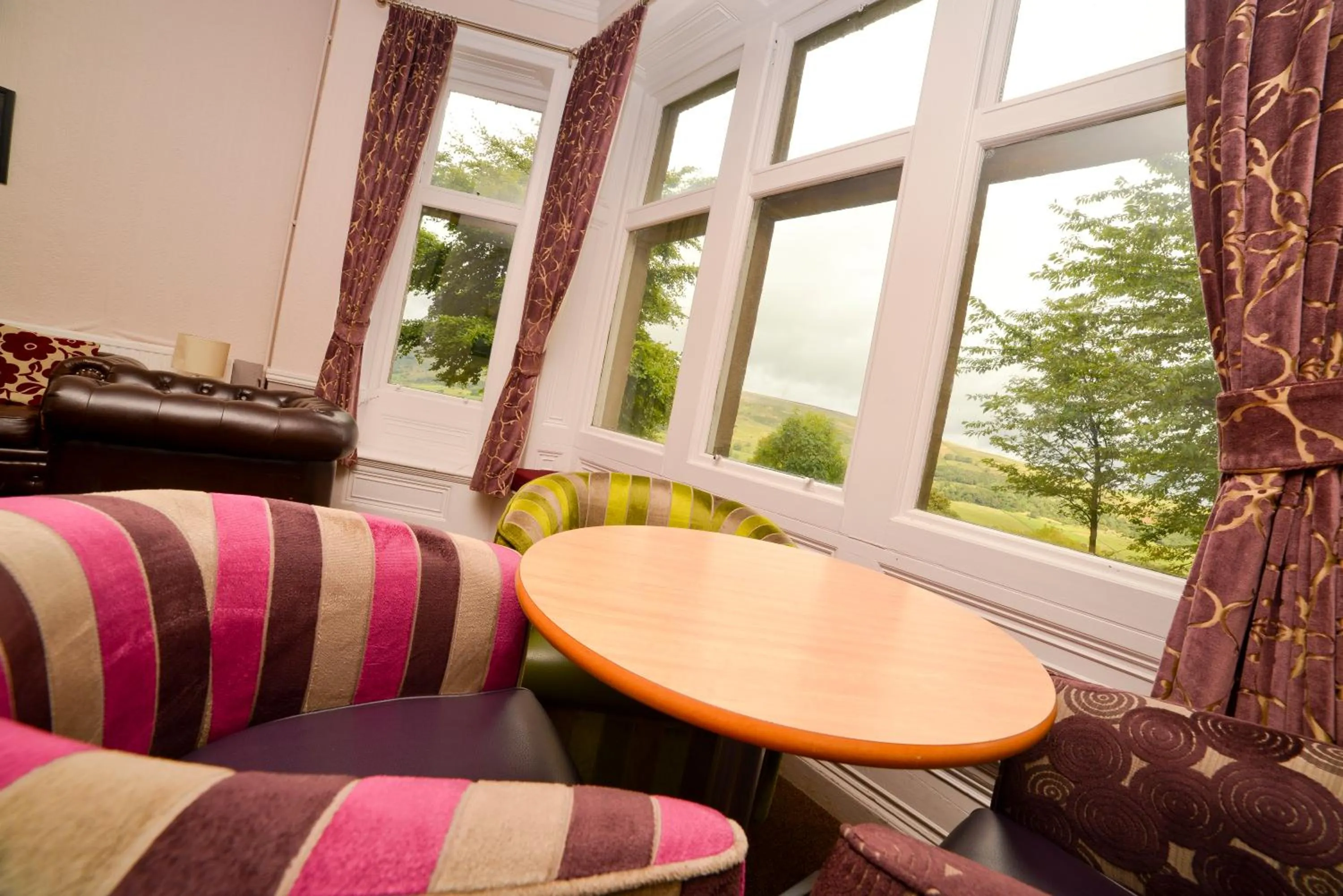 Communal lounge/ TV room in YHA Grinton Lodge