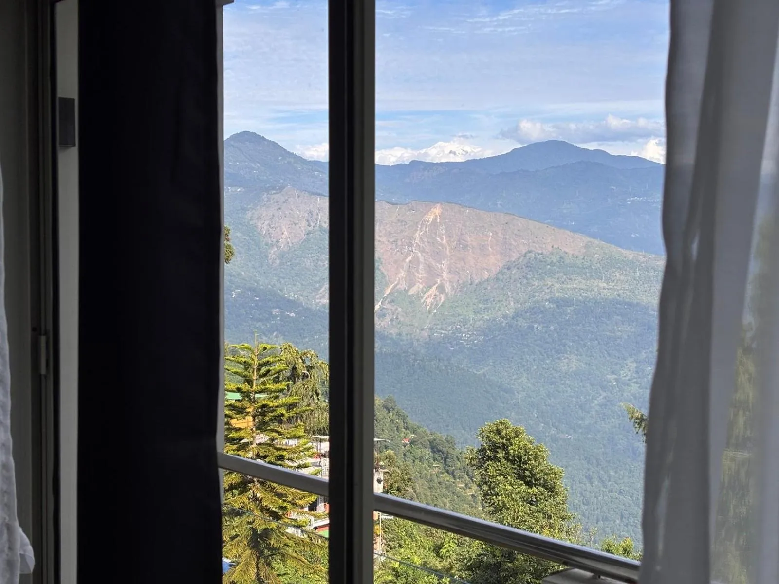 Day in Sood's Himalayan Vista