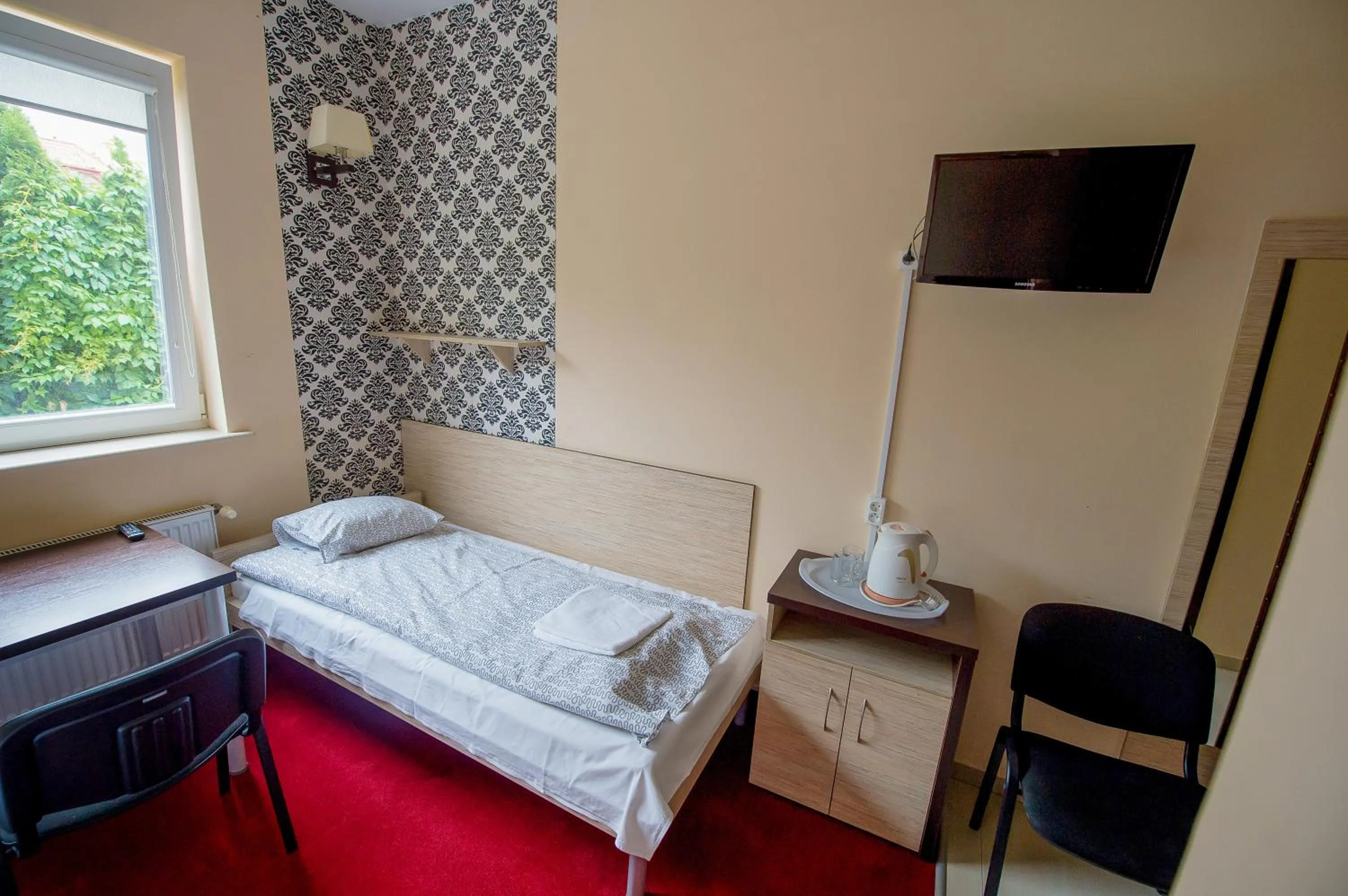 Garden view, Bed in Hotelik Jankowski
