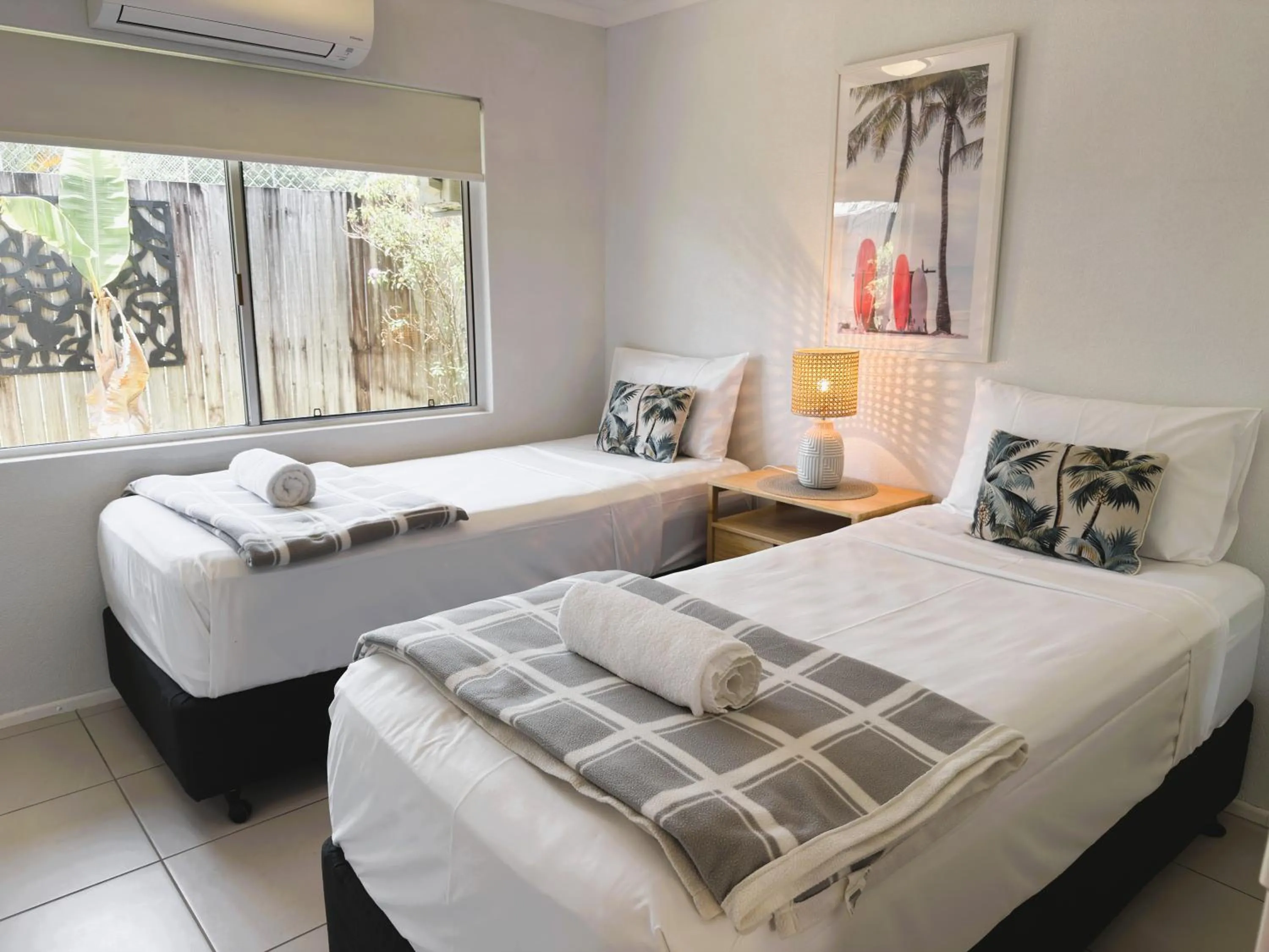 Bed in Lychee Tree Holiday Apartments