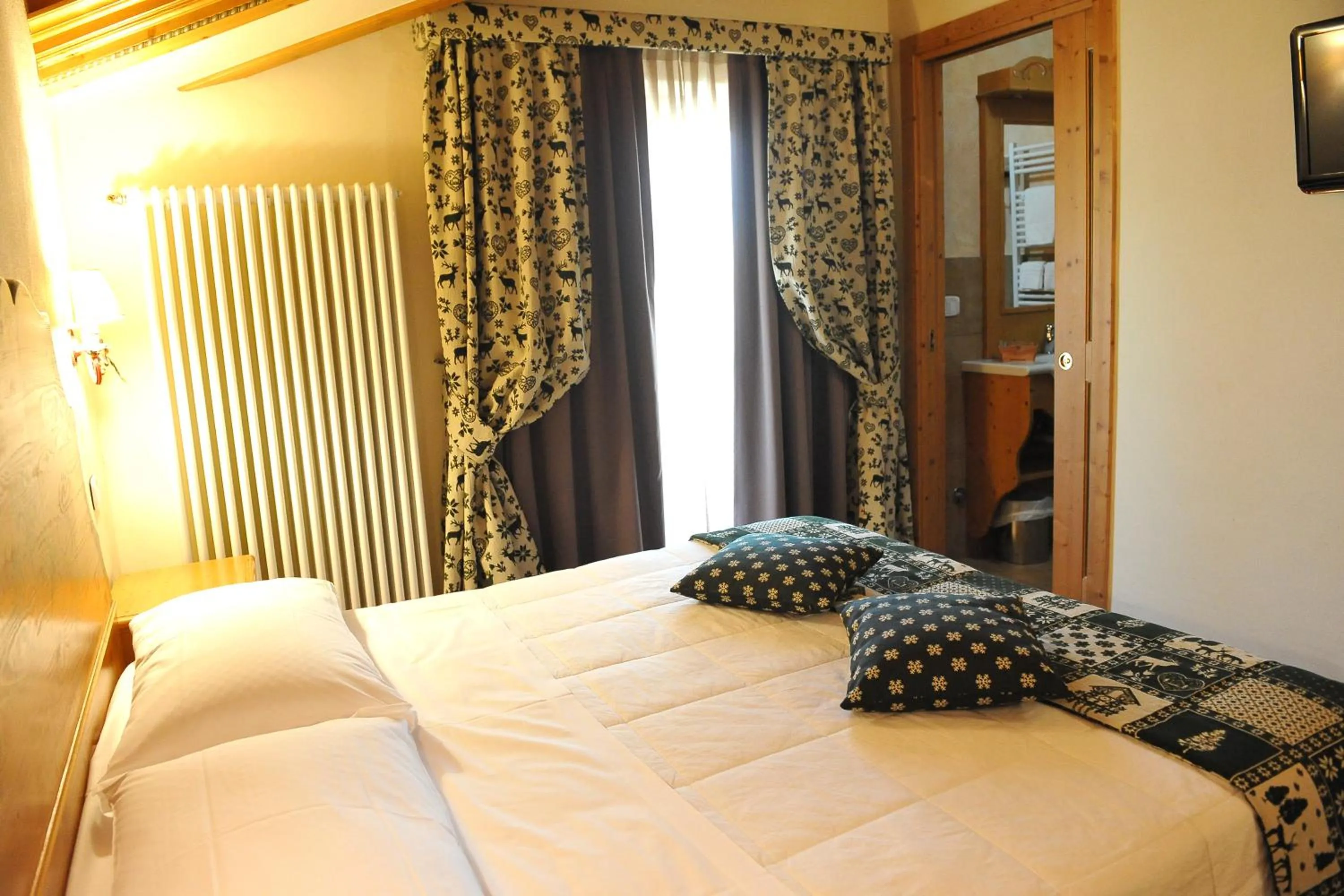 Bed in Garnì Astoria Hotel & SPA