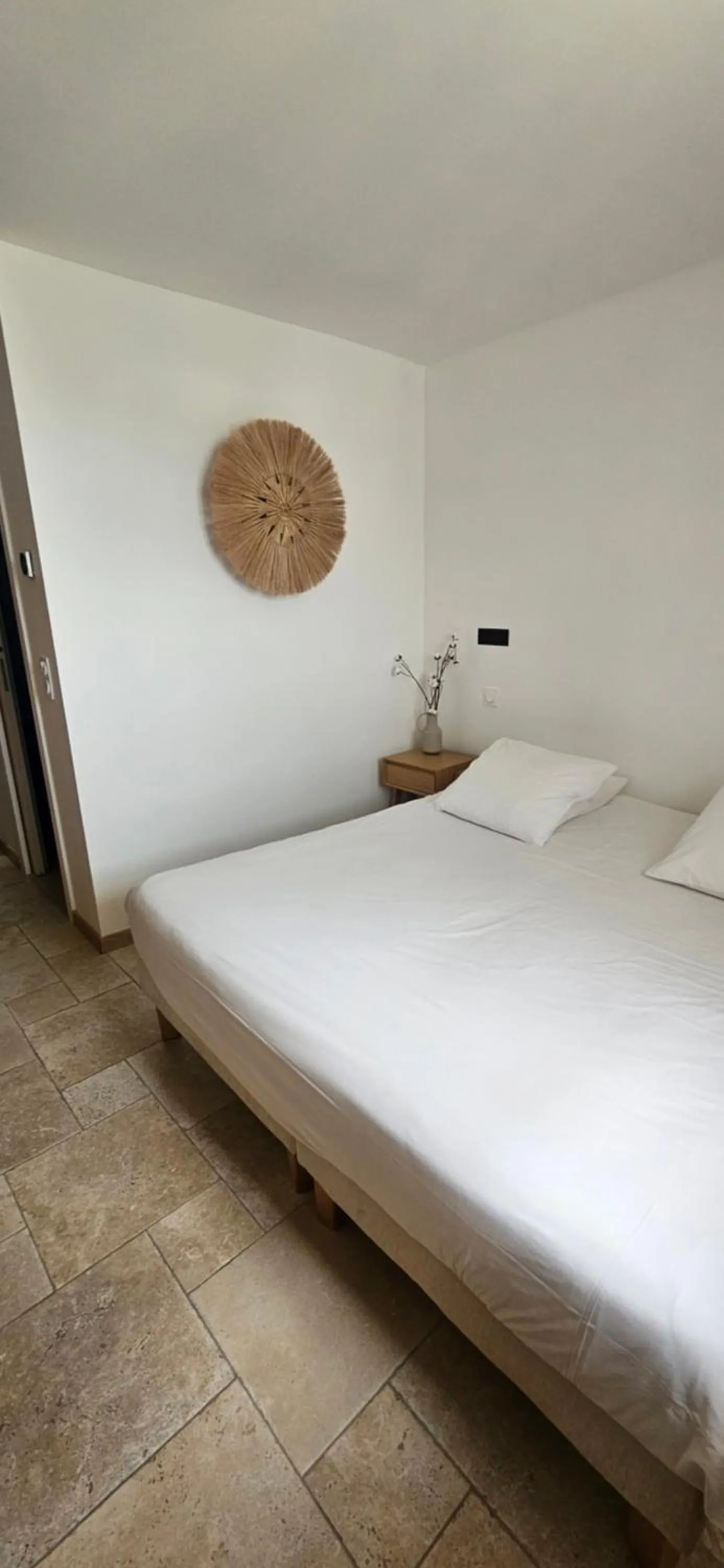 Bed in Le Royal Hôtel Restaurant
