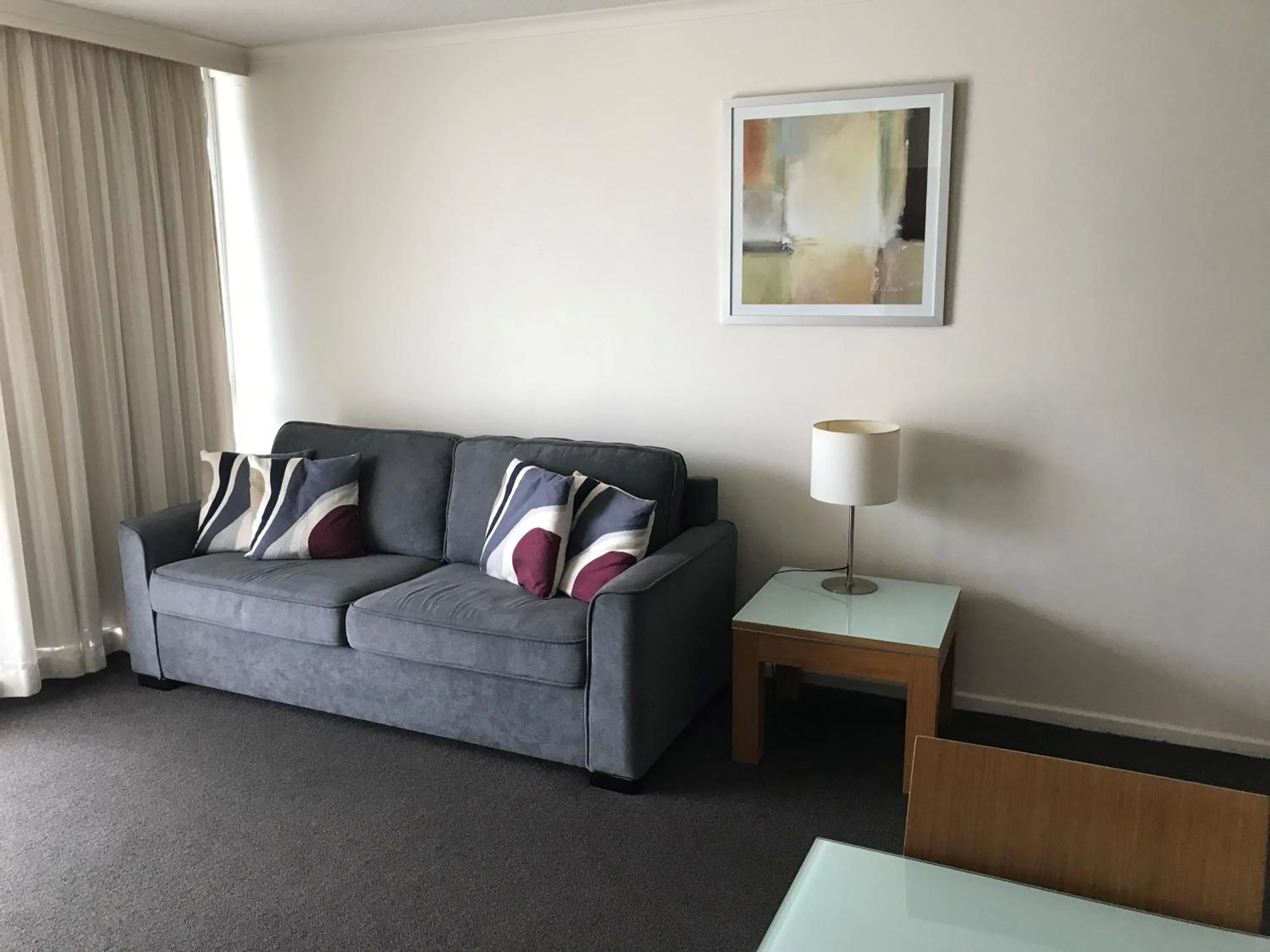 Living room in Highpoint International Hotel