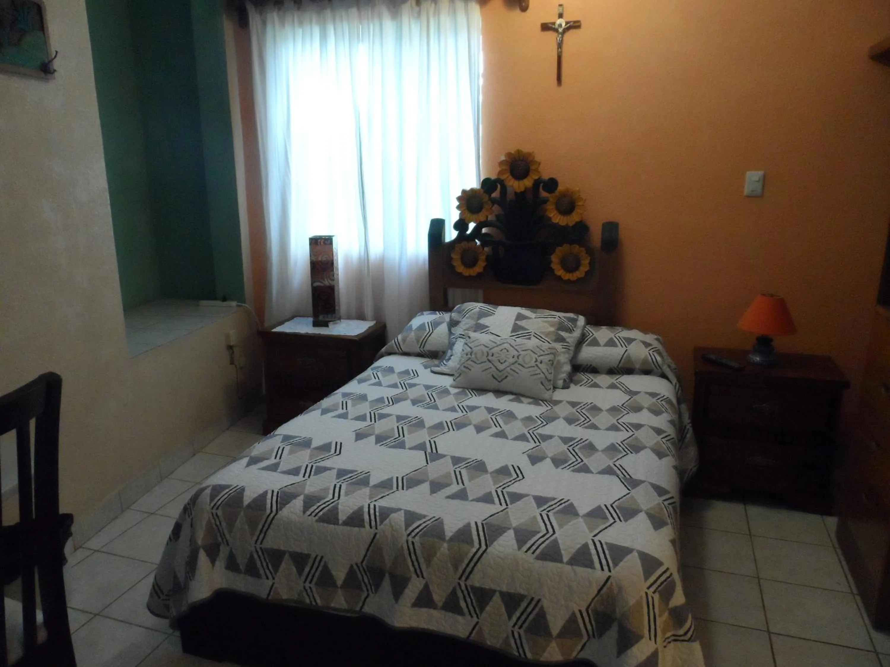 Decorative detail, Bed in Hotel Internacional Malitsin