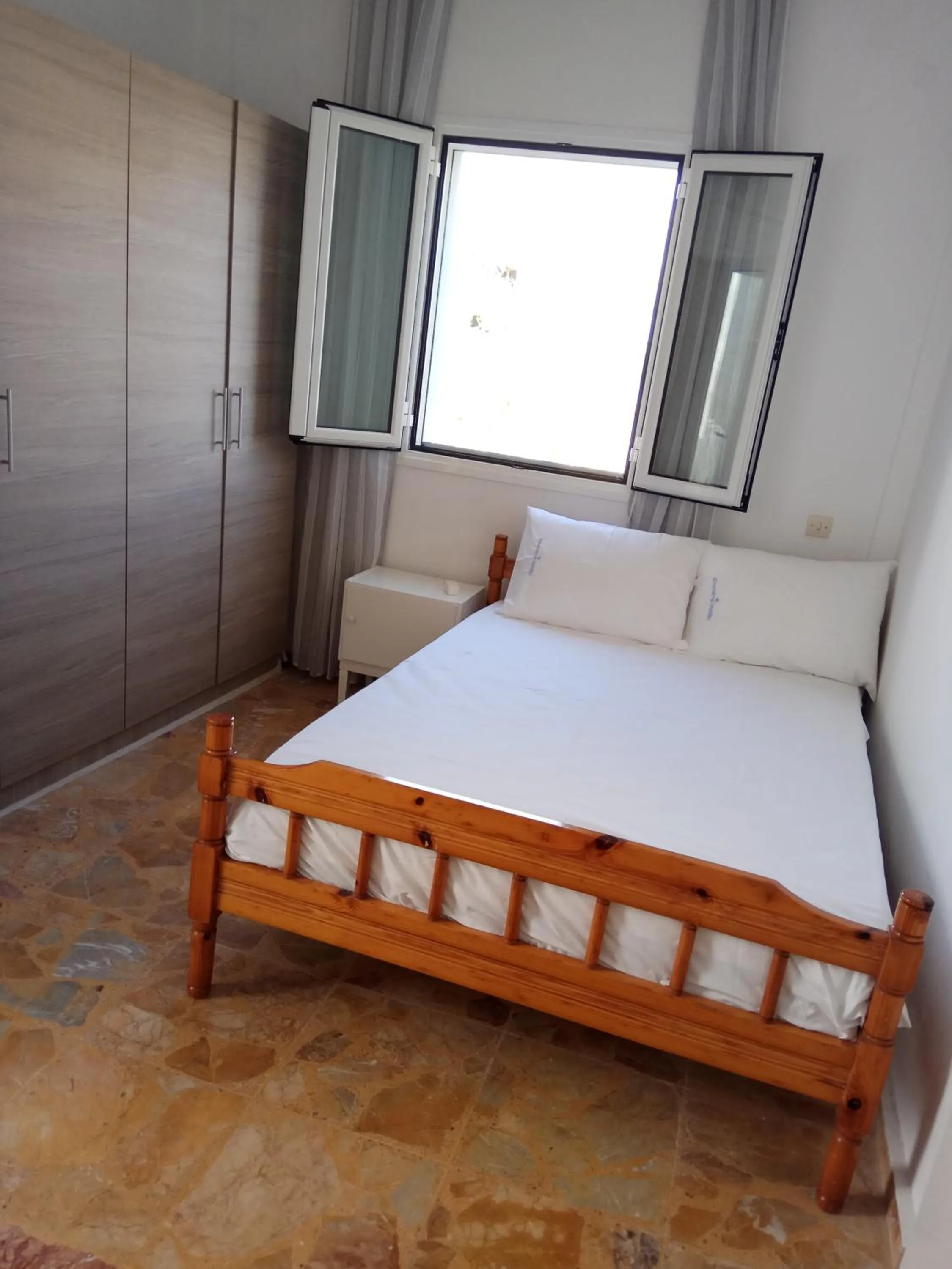 Bed in Grandma Vasiliki Rooms To Let